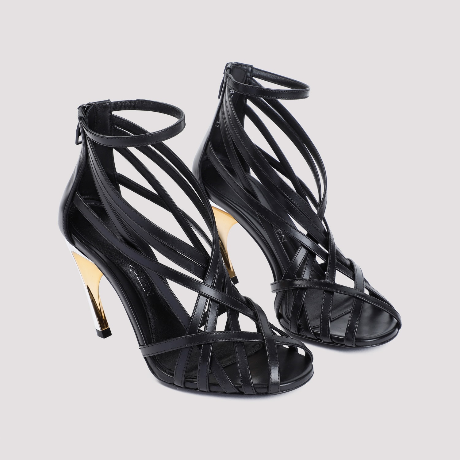 サンダル・ミュール ALEXANDER MCQUEEN ARMADILLO STRAPPY SANDALS Alexander McQueen Armadillo Strap Sandals In Black/gold
