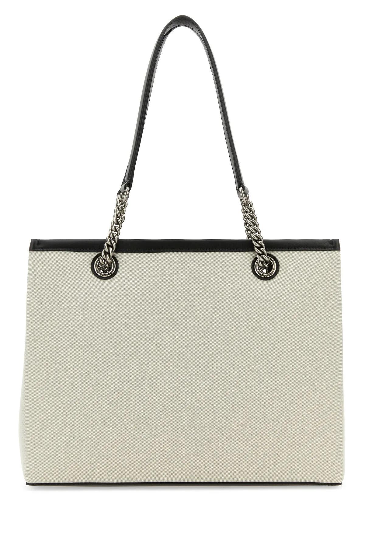 トートバッグ Balenciaga Ivory Canvas M Duty Free Shopping Bag BALENCIAGA Ivory Canvas M Duty Free Shopping Bag | italist
