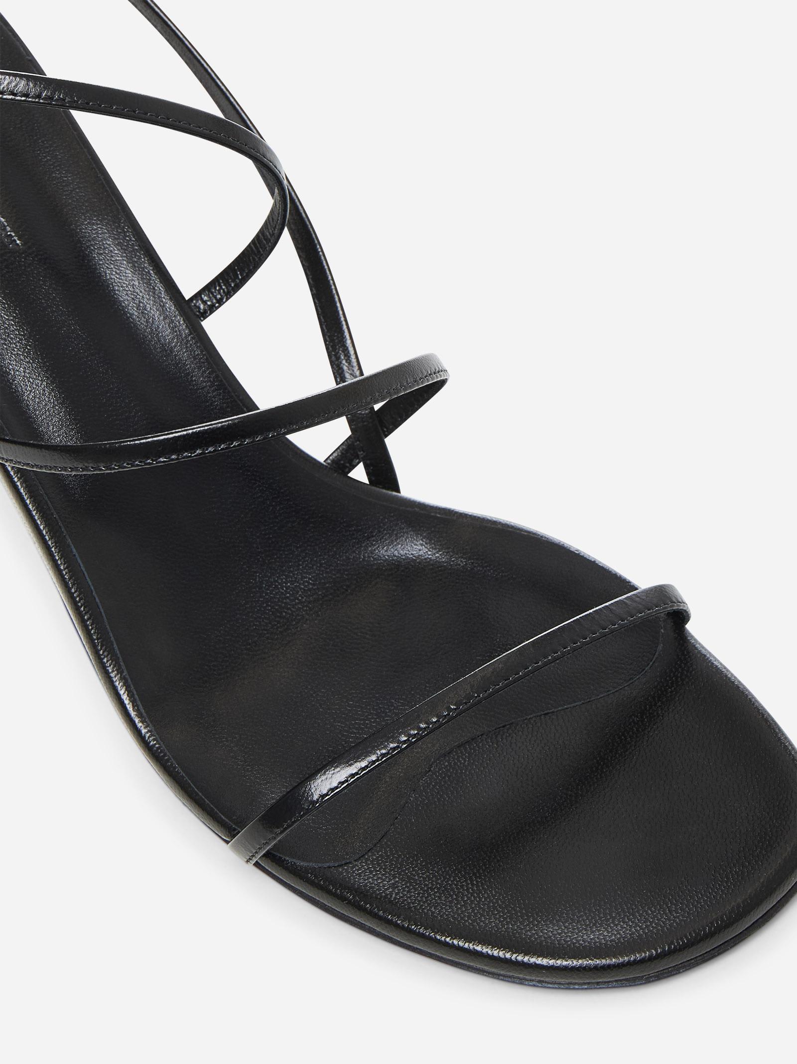 Khaite Black Leather Loop Sandals | italist