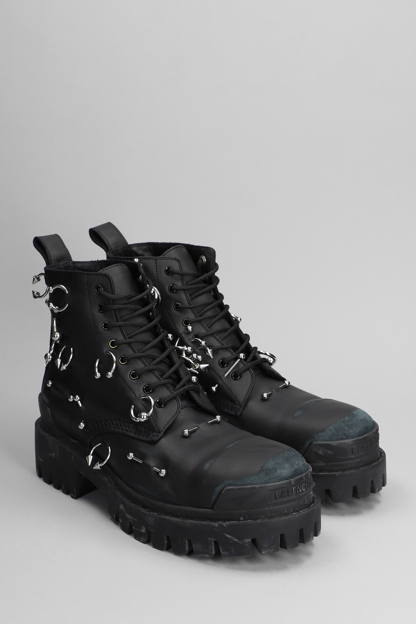 Balenciaga Strike Piercing Combat Boots In Black Leather