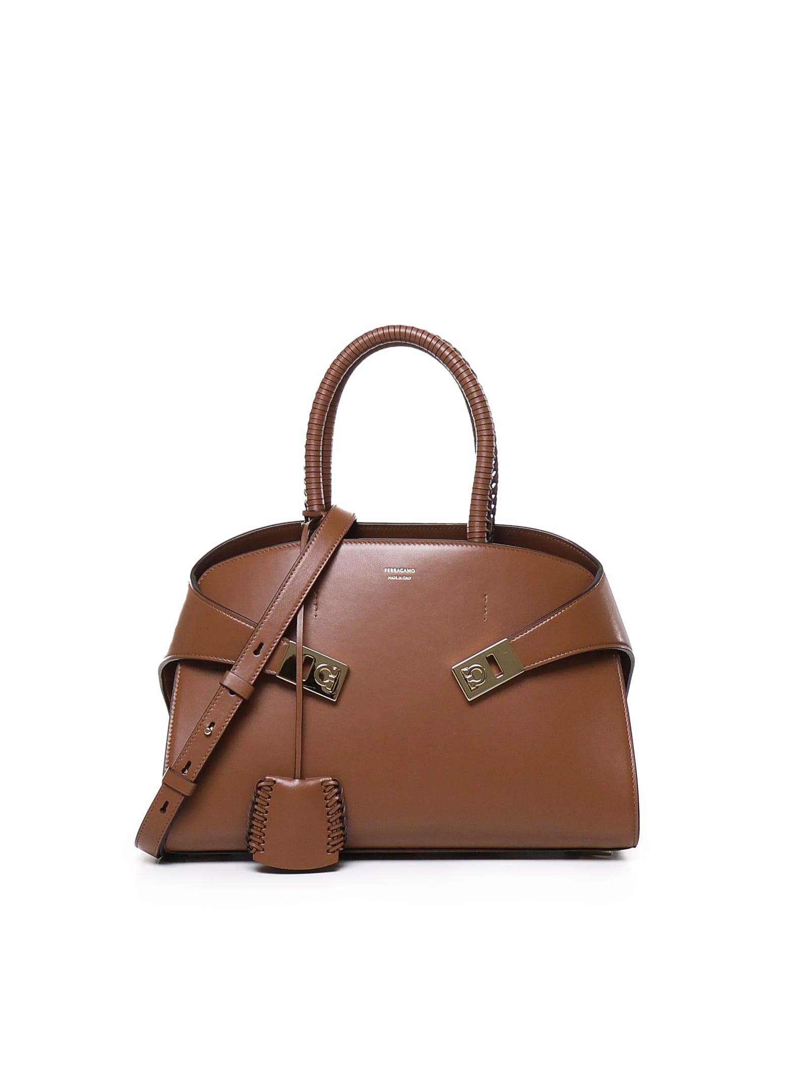 Shop Ferragamo Hug Handbag (s) In Brown