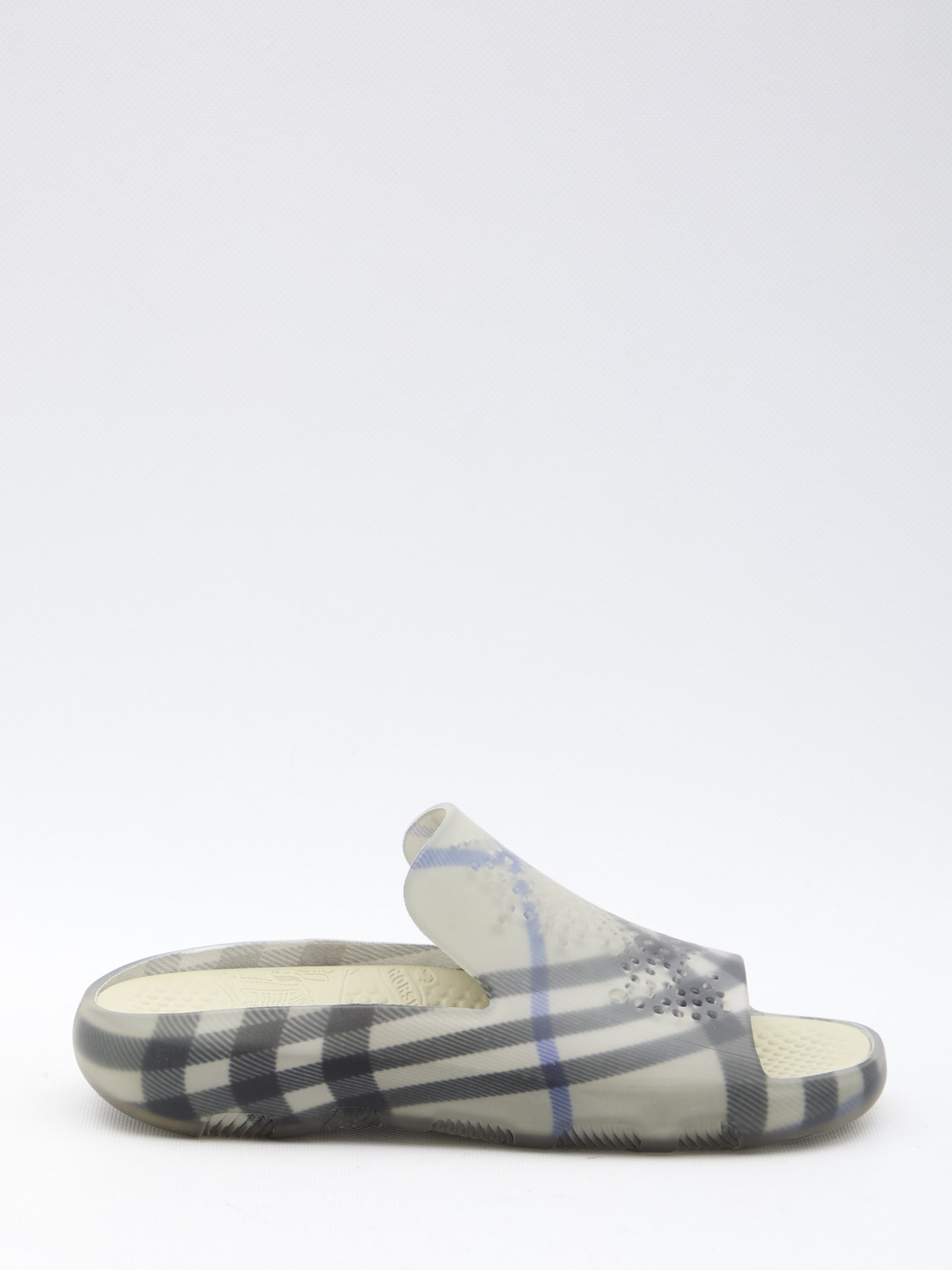 Shop Burberry Stingray Slippers In Beige