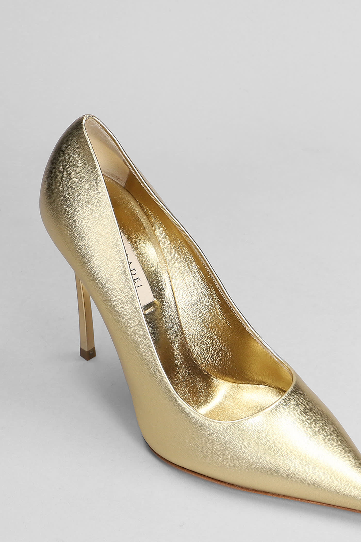 Shop Casadei Blade Flash Pumps In Gold Leather