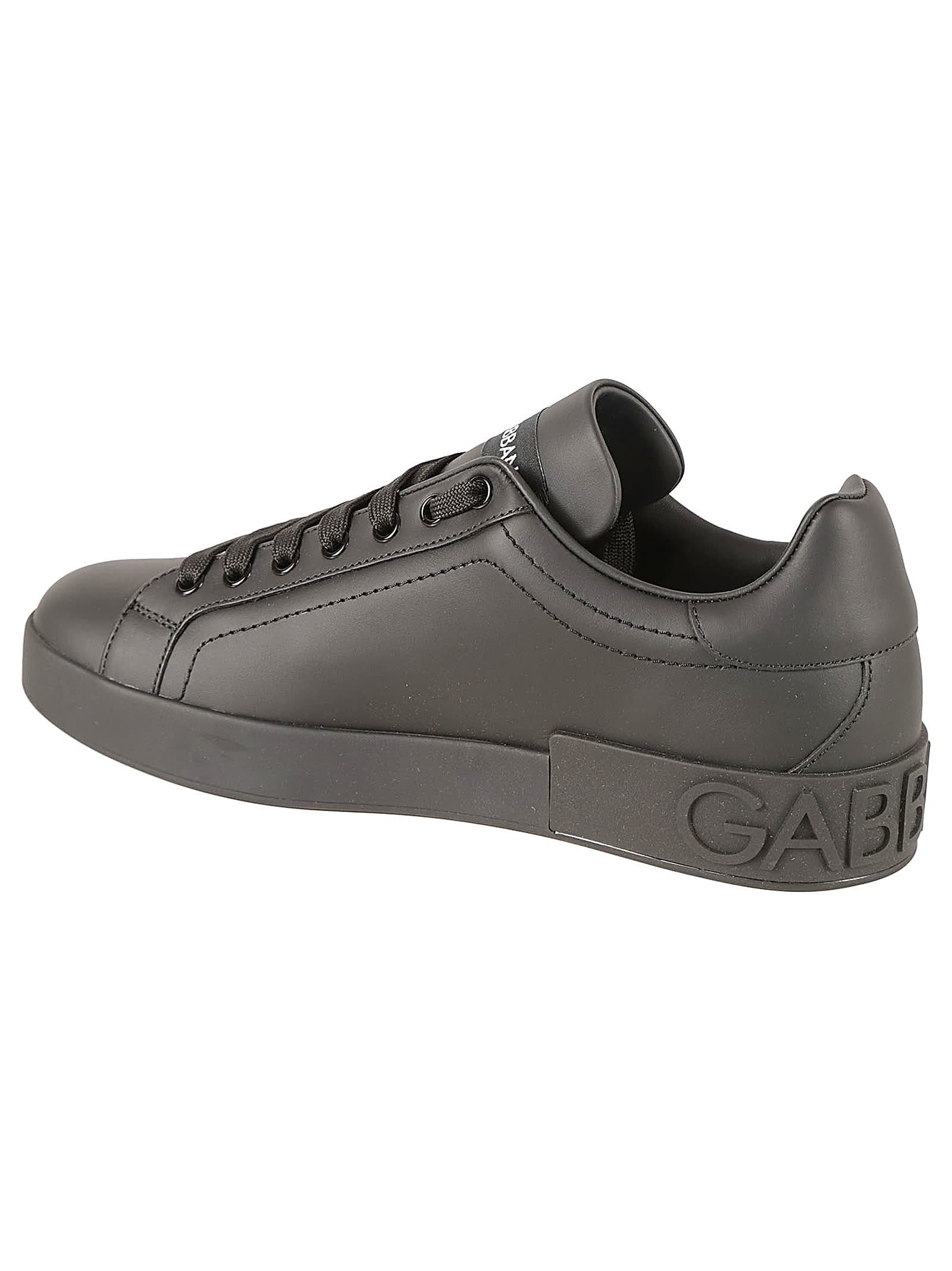 Shop Dolce & Gabbana Logo Embossed Sole Sneakers In Black