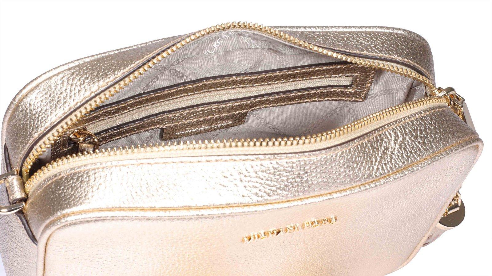 Shop Michael Michael Kors Ginny Crossbody Bag In Pale Gold
