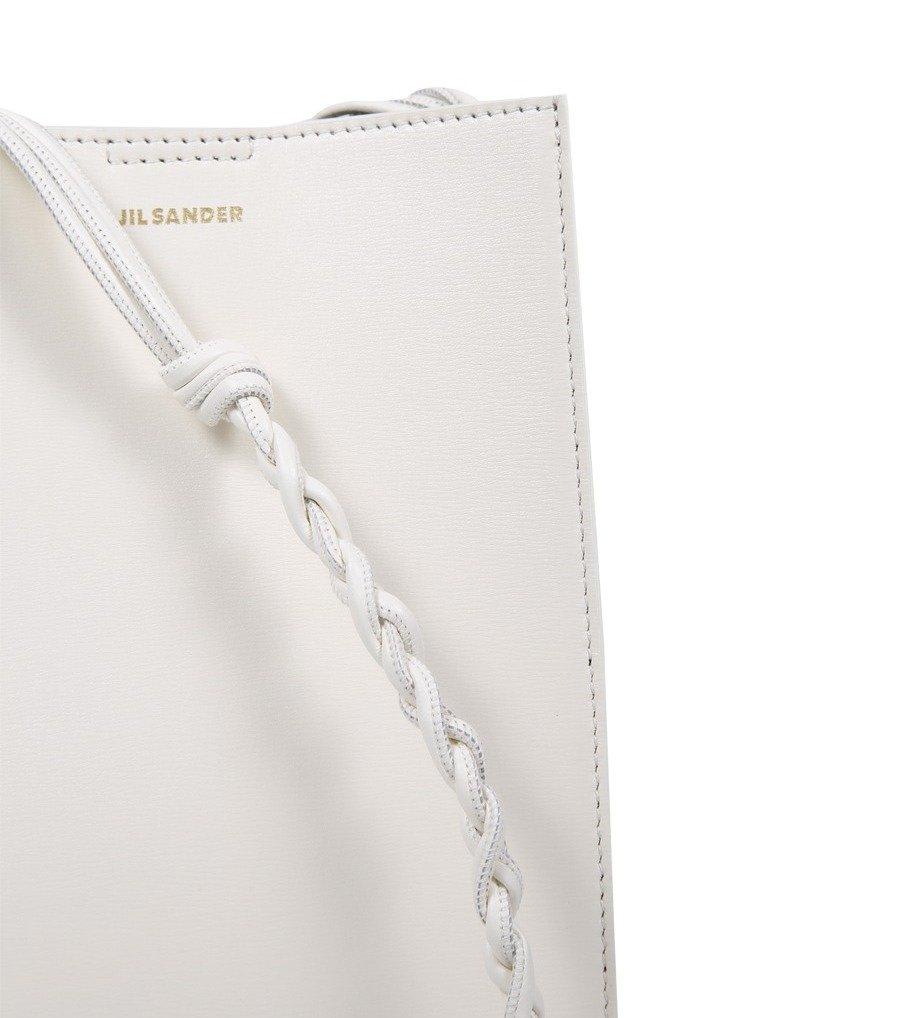 Shop Jil Sander Tangle Logo Printed Crossbody Bag In Beige