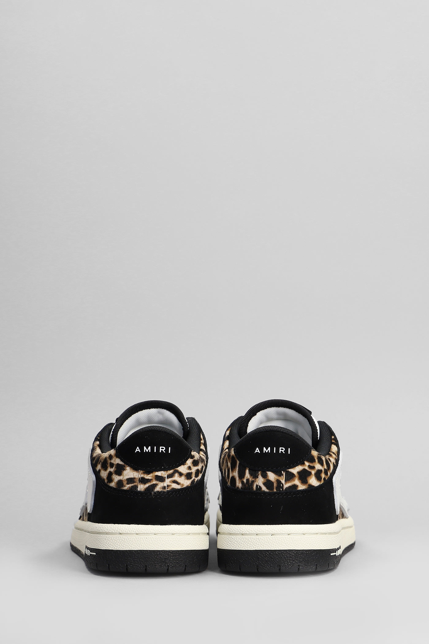 AMIRI LEOPARD SKEL TOP LOW SNEAKERS IN BLACK LEATHER 