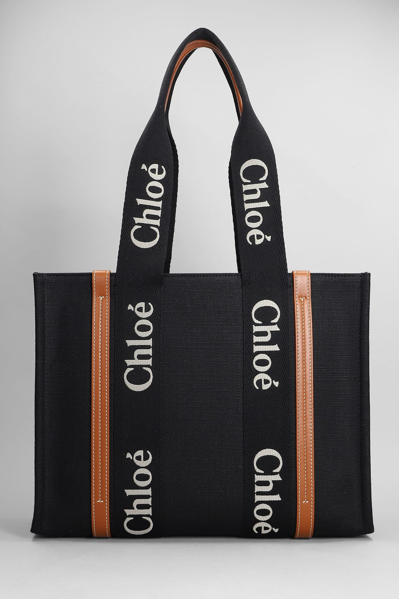 Shop Chloé Woody Tote In Black Canvas
