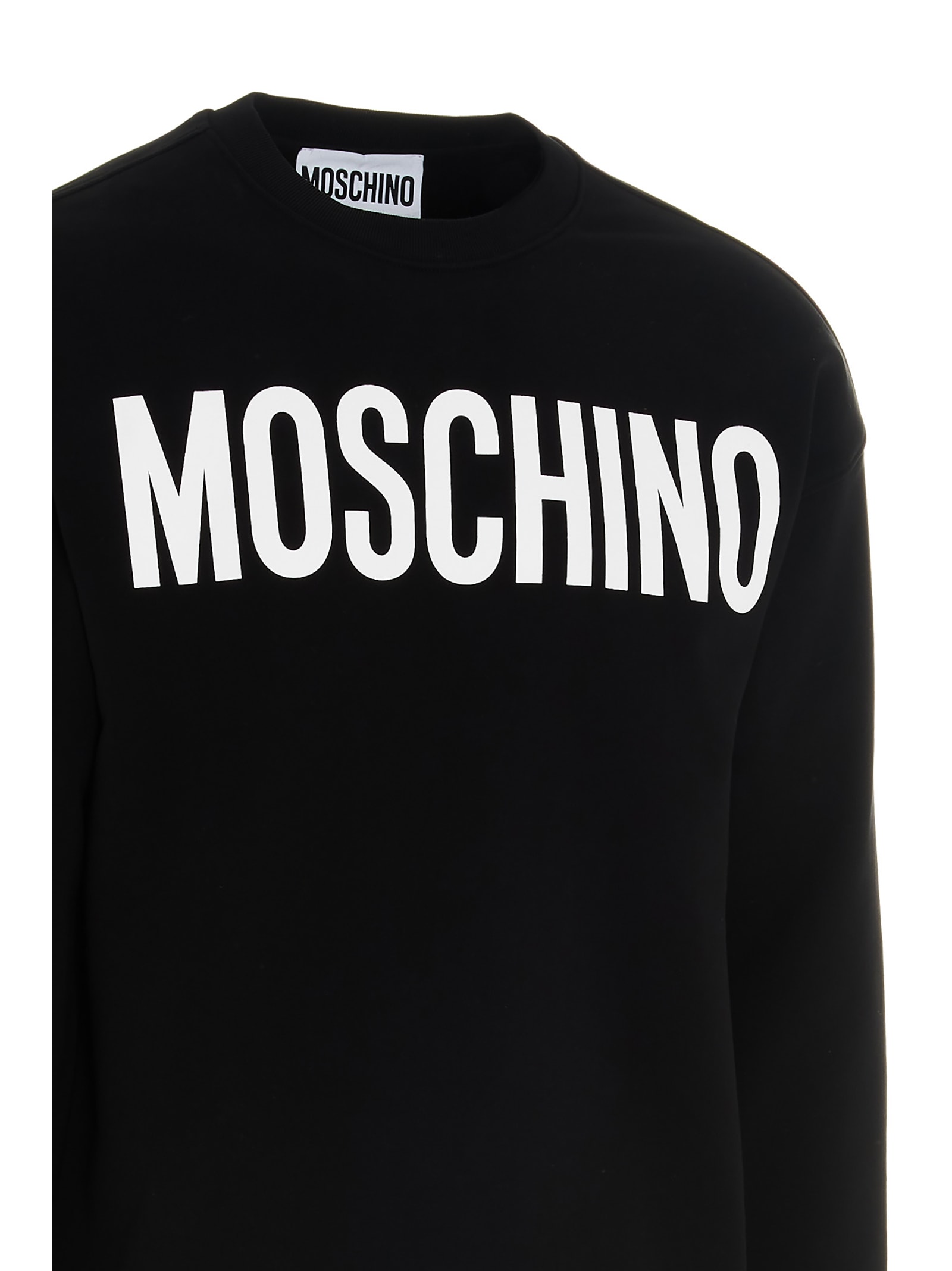 Shop Moschino Lettering Logo Print Sweatshirt In White/black
