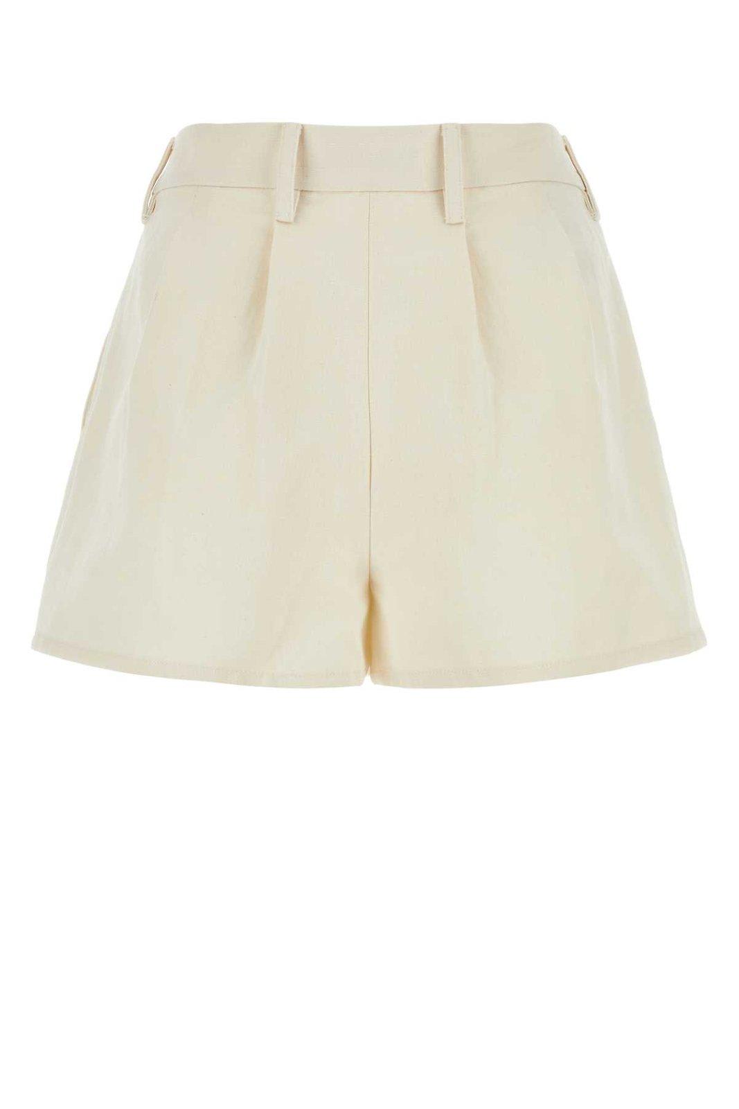 Shop Prada Belted Pleated Shorts In Beige