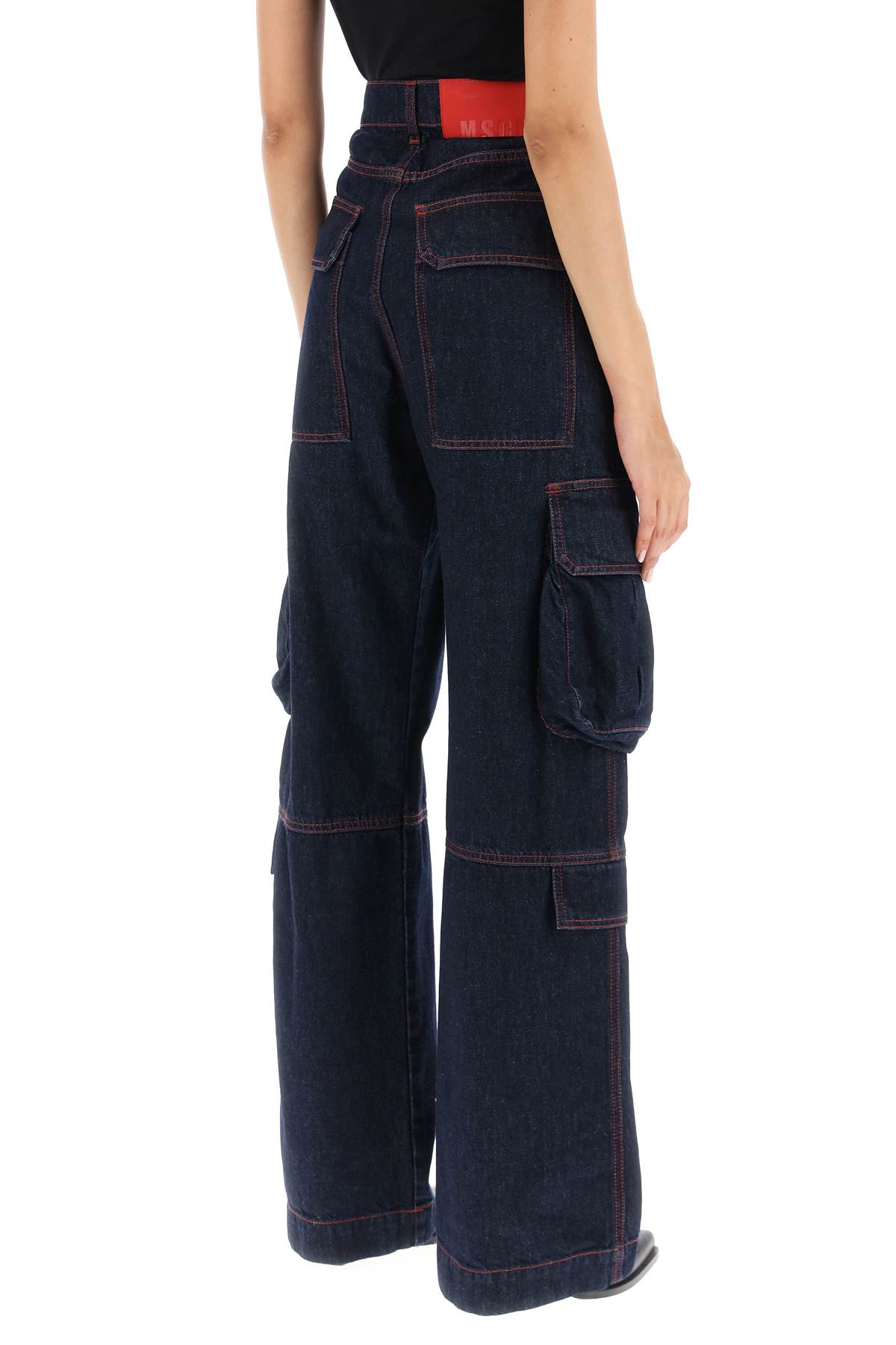 Shop Msgm Cargo Jeans With Flared Cut In Blue