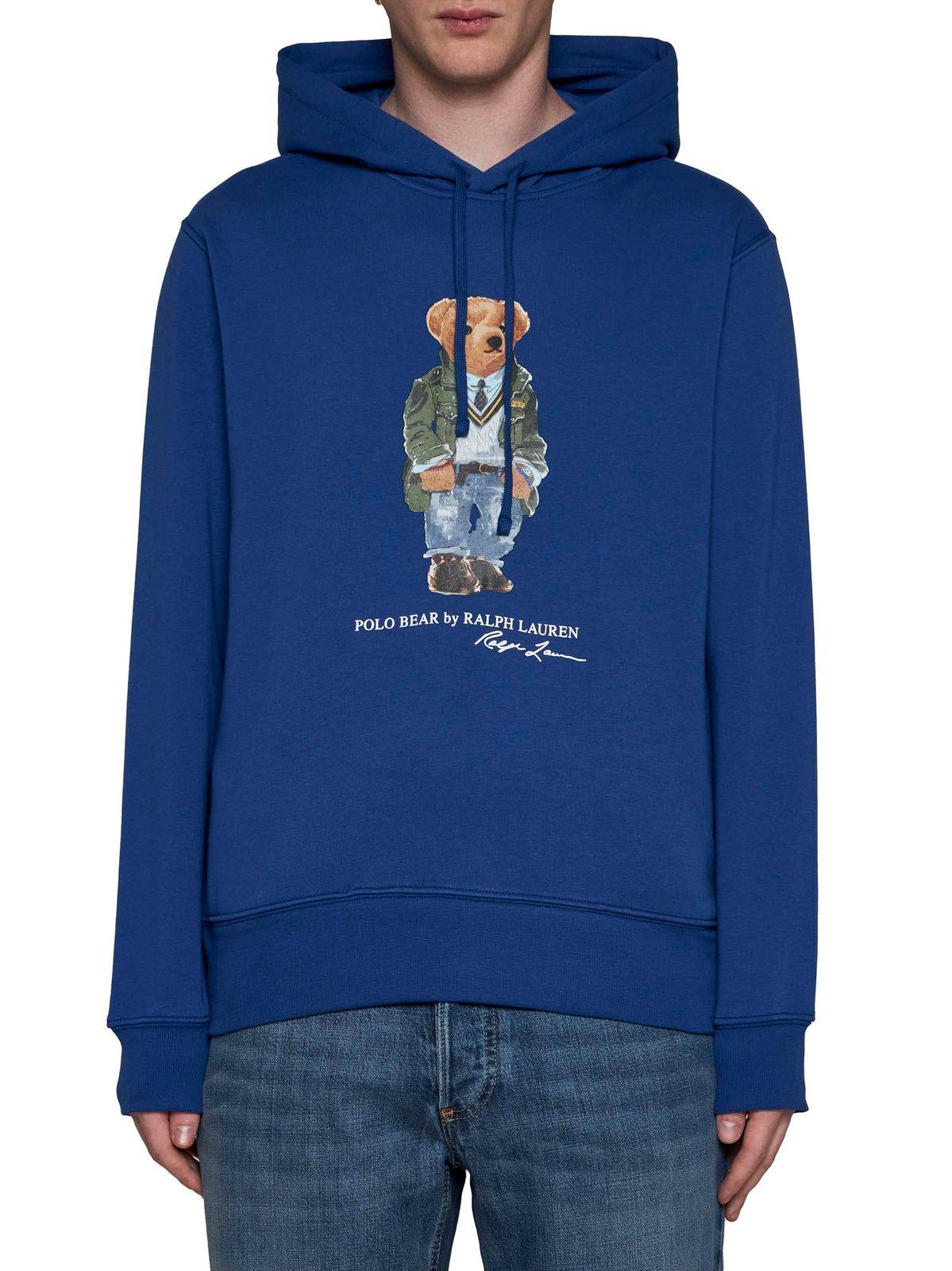 Shop Polo Ralph Lauren Bear Printed Drawstring Hoodie In Blu