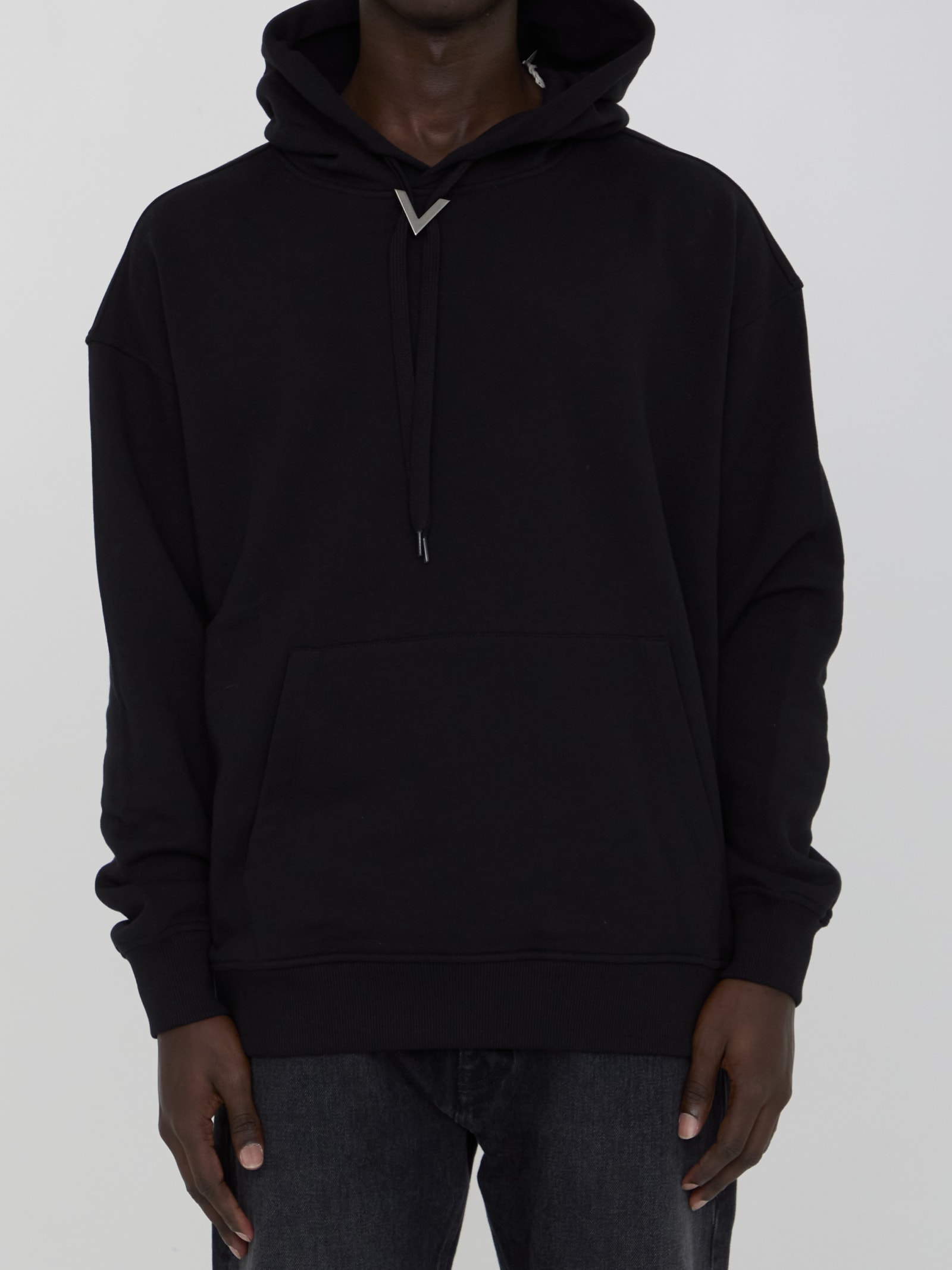 Shop Valentino Hoodie With Metallic V Detail In Black