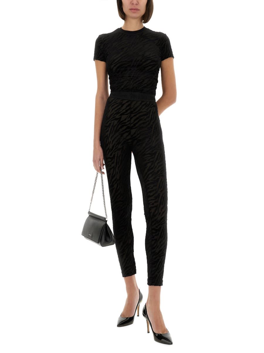 Shop Versace Jeans Couture Zebra Devoré Leggings In Black