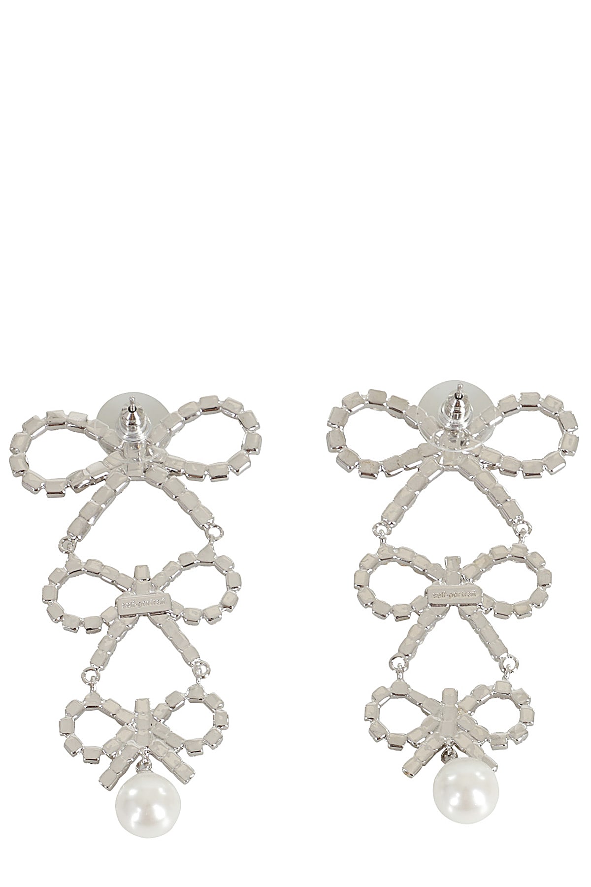 Shop Self-portrait Tiered Crystal Bow Earrings In Silver