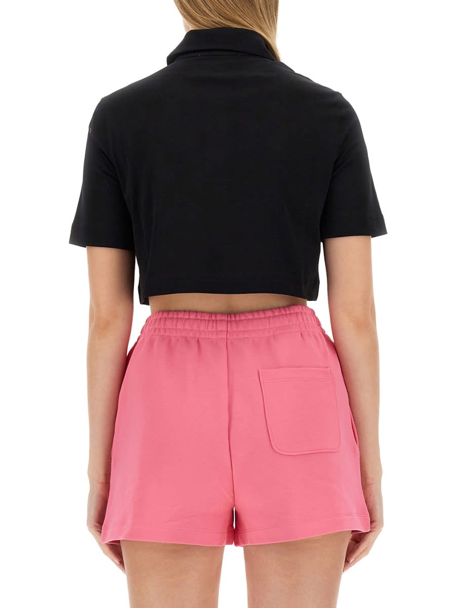 Shop Moschino Cropped Fit Polo Shirt In Black