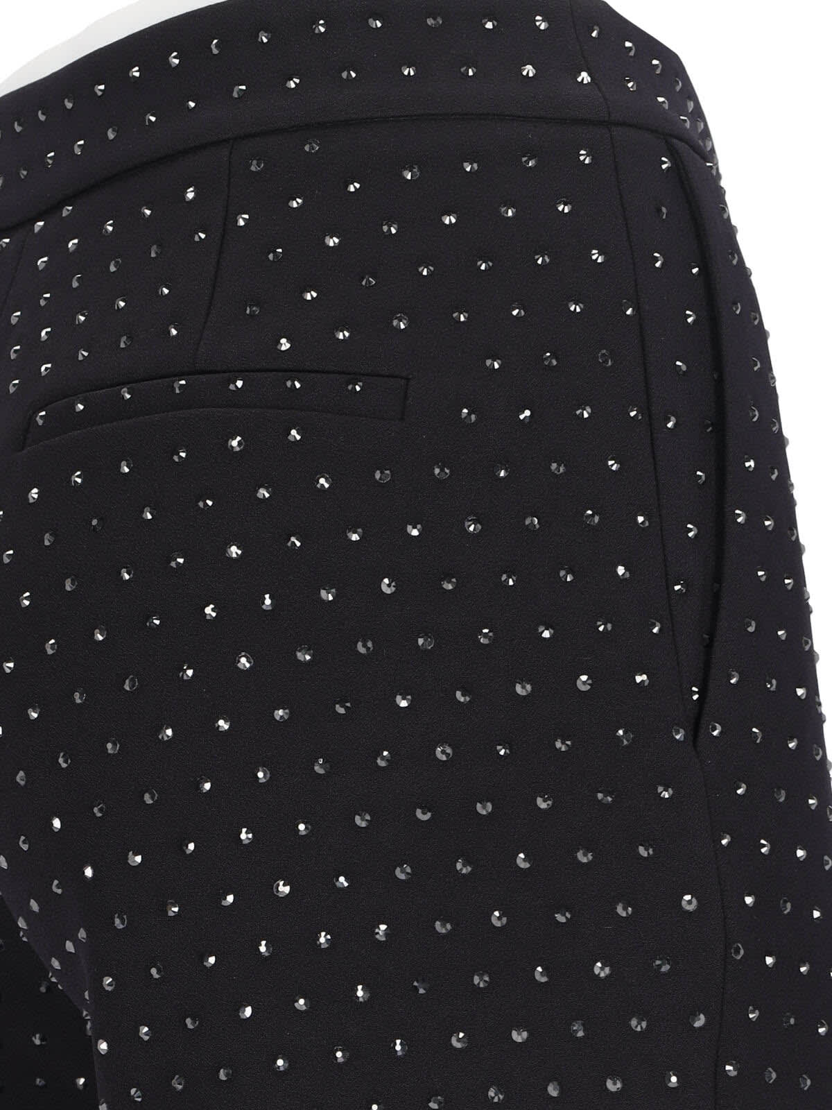 The Andamane Flared High Waist Trousers With Stud Embellishments In Black