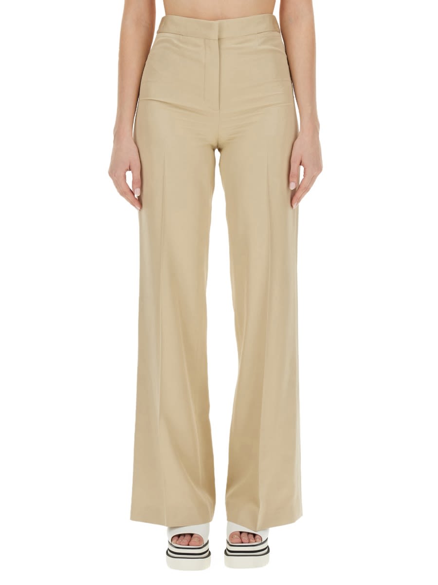 Shop Stella Mccartney Flare Fit Pants In Beige