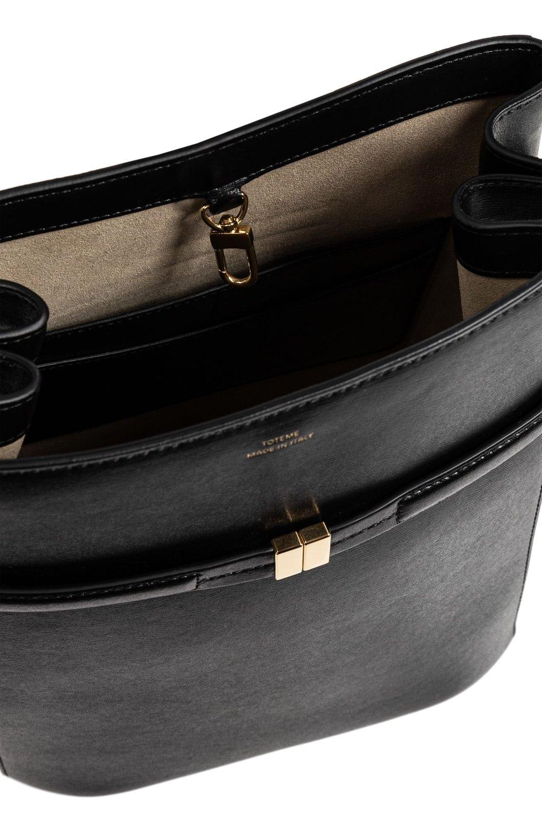 Totême Belted Palmellata Leather Bucket Bag In Black