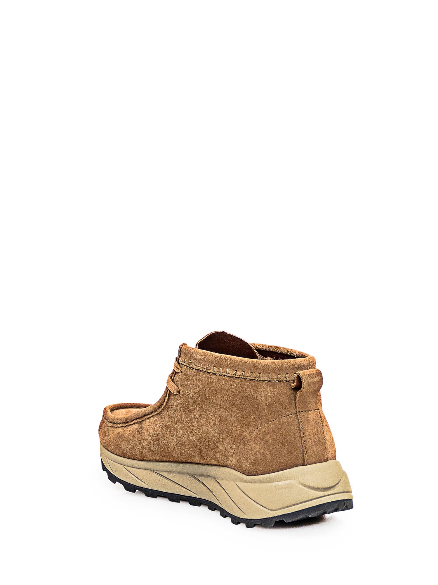 Shop Clarks Wallabee Boots In Brown