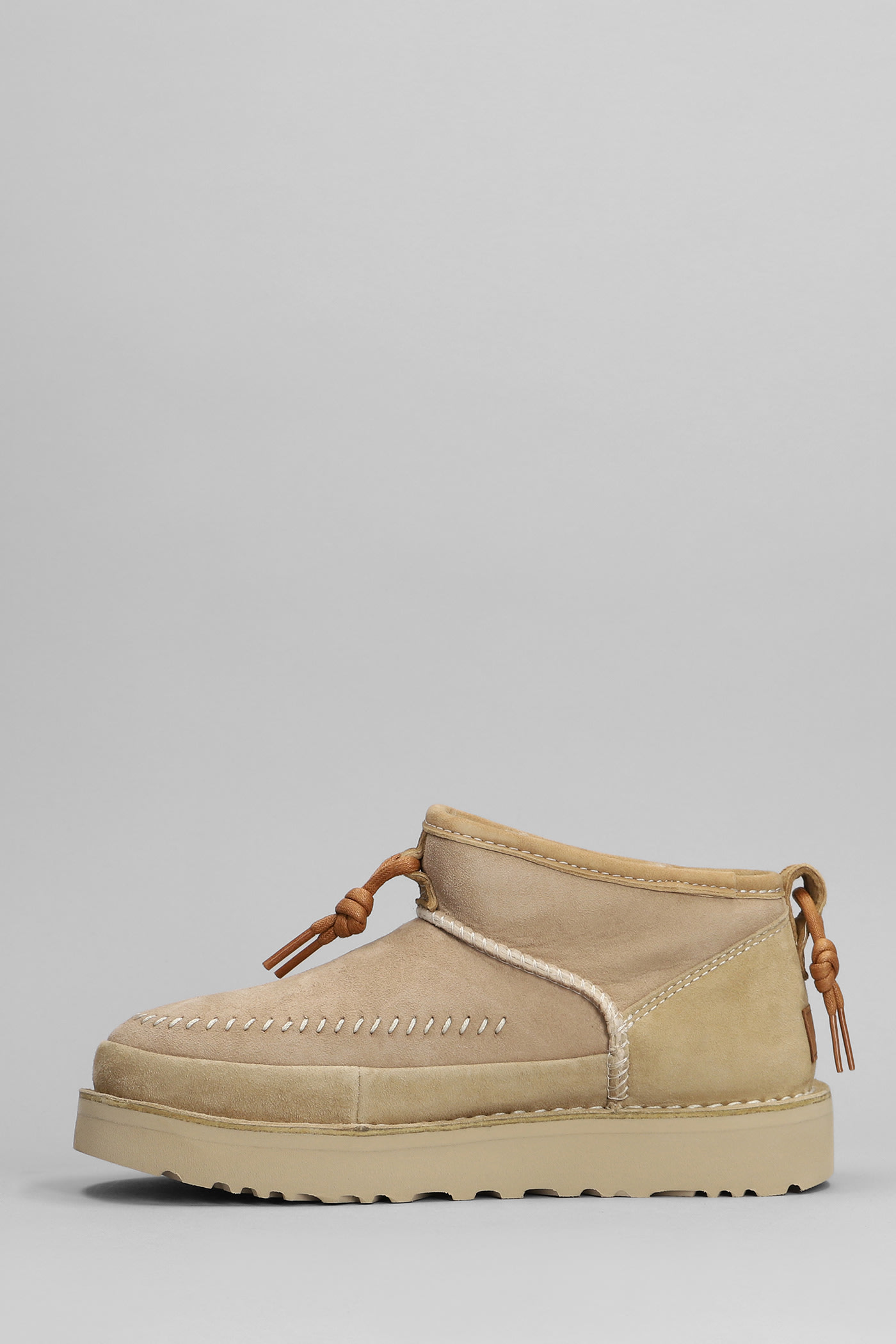 Shop Ugg Ultra Mini Crafted Low Heels Ankle Boots In Beige Suede