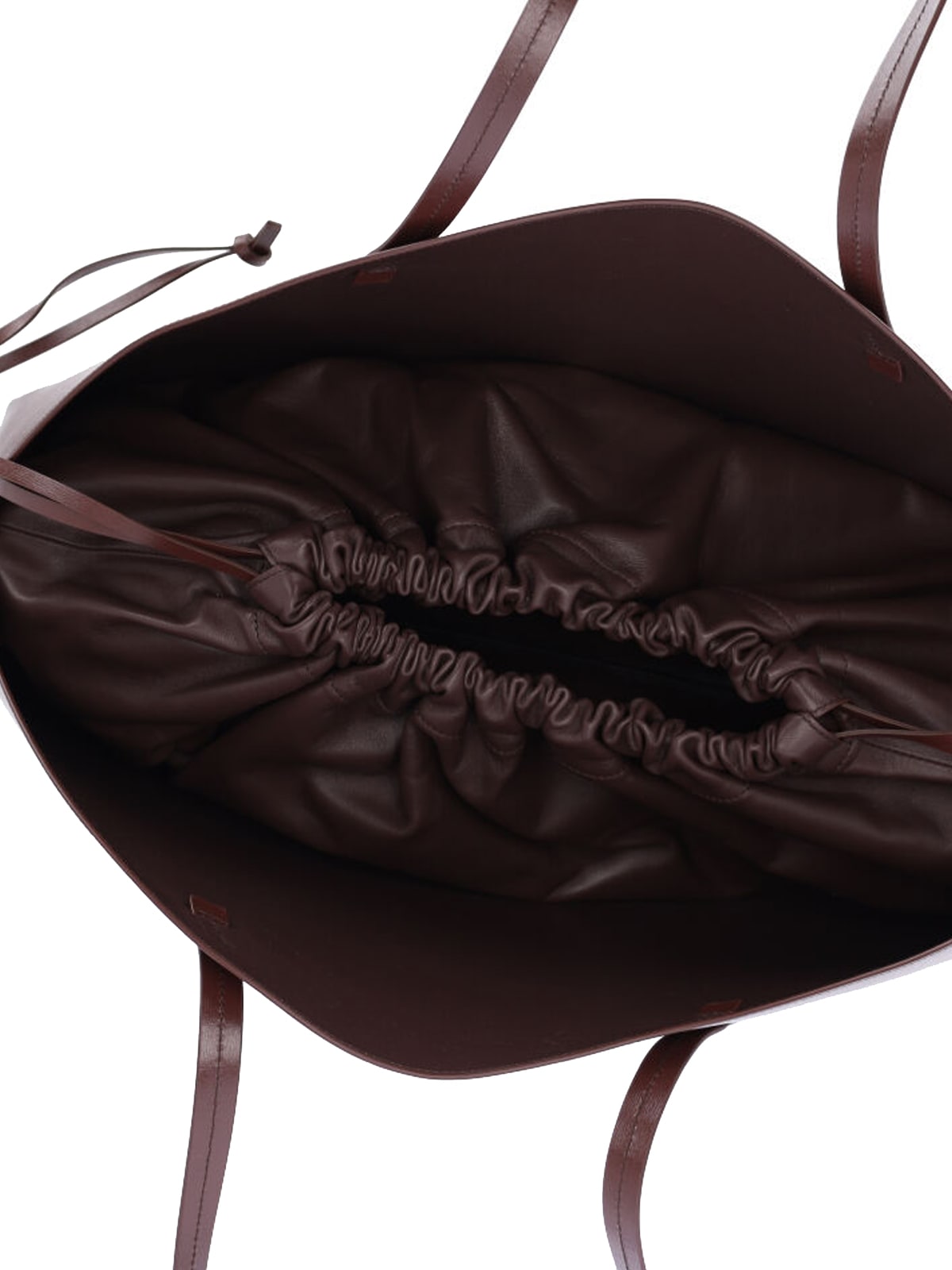 Jil Sander Logo Printed Drawstring Shoulder Bag In Brown