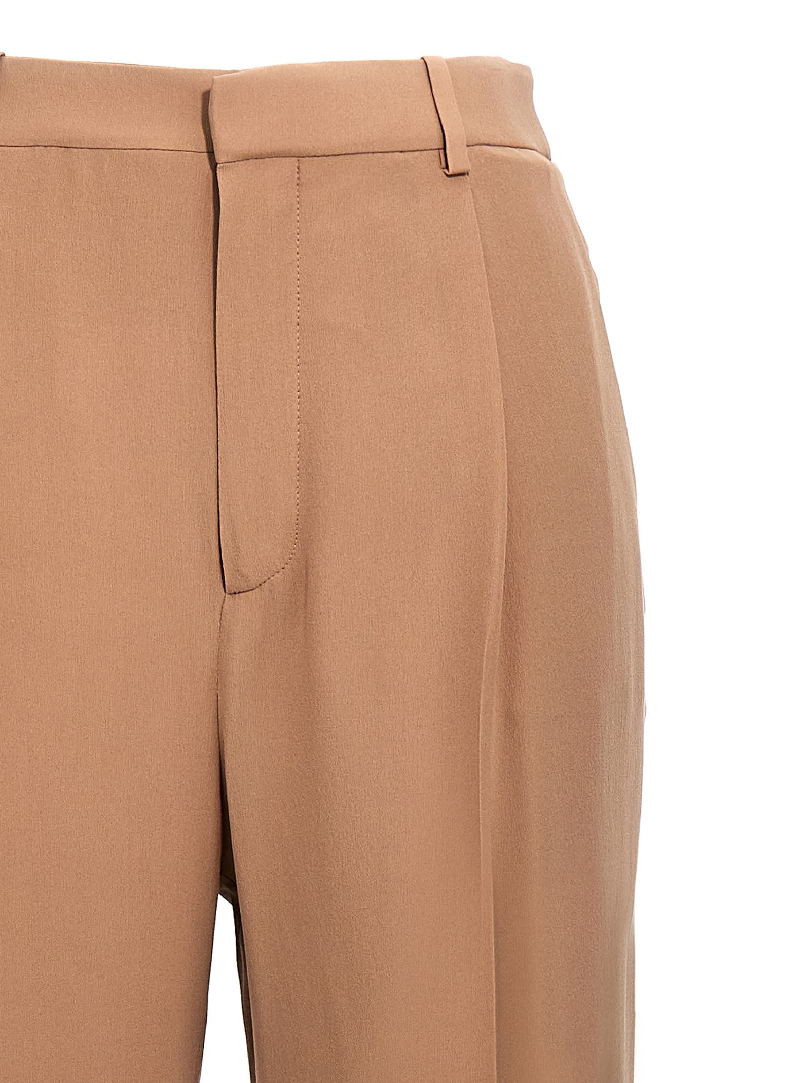 Shop Saint Laurent Crepe Silk Pants In Beige