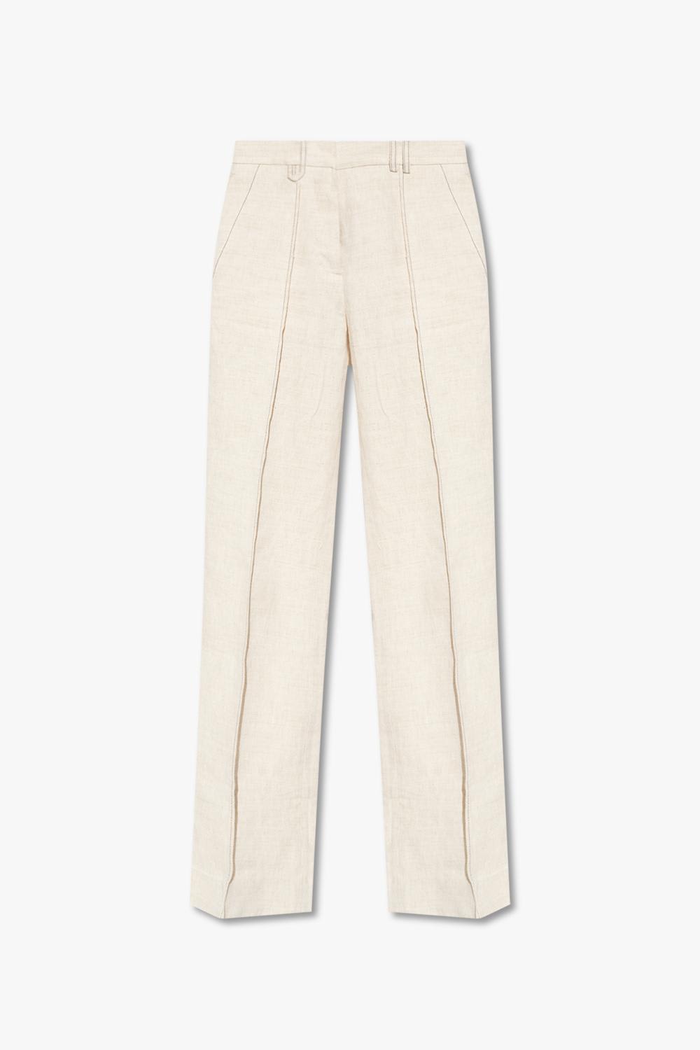 Shop Jacquemus Camargue Pleat-front Trousers In Beige