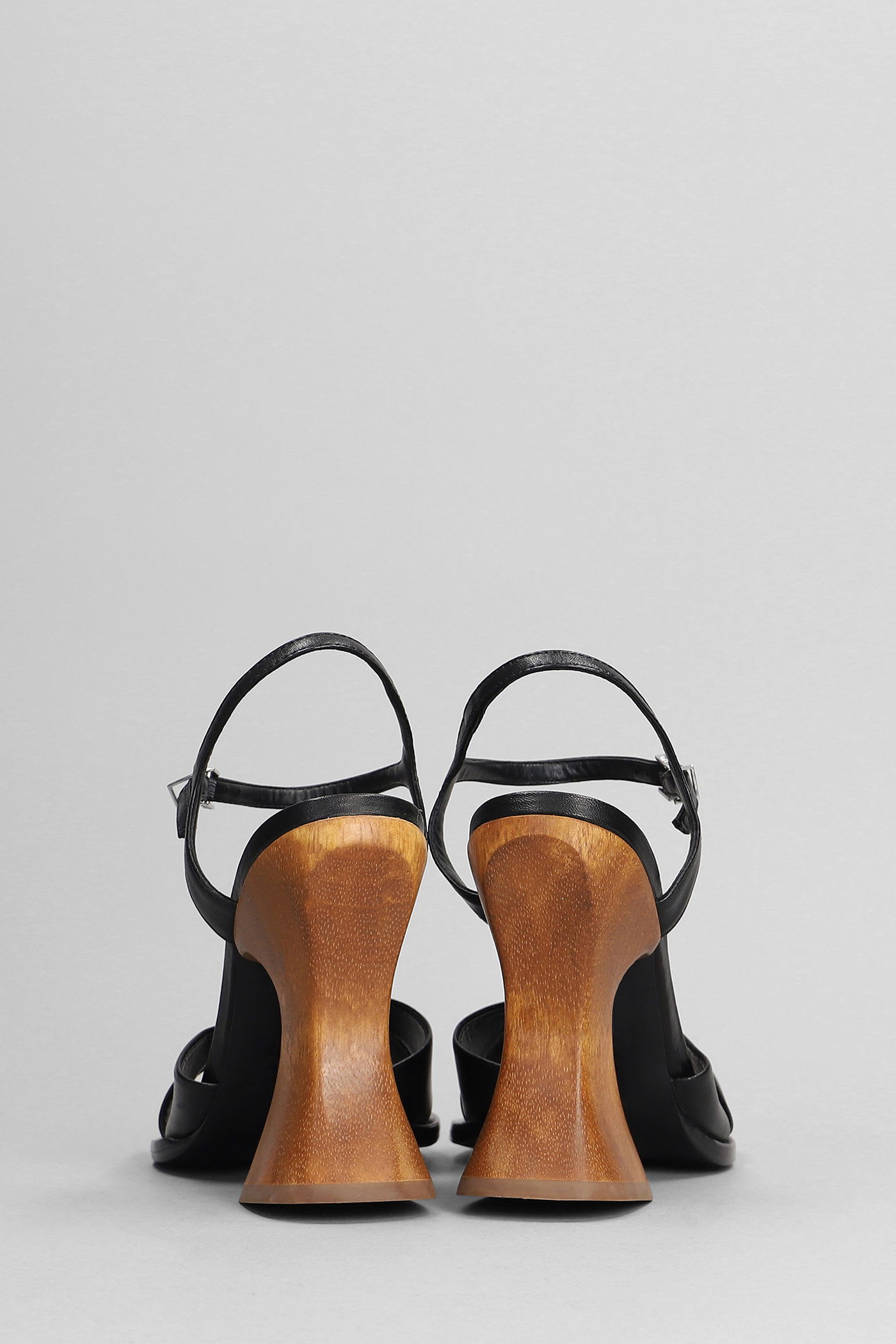 Shop Schutz Hilda Curve Sandals In Black Leather