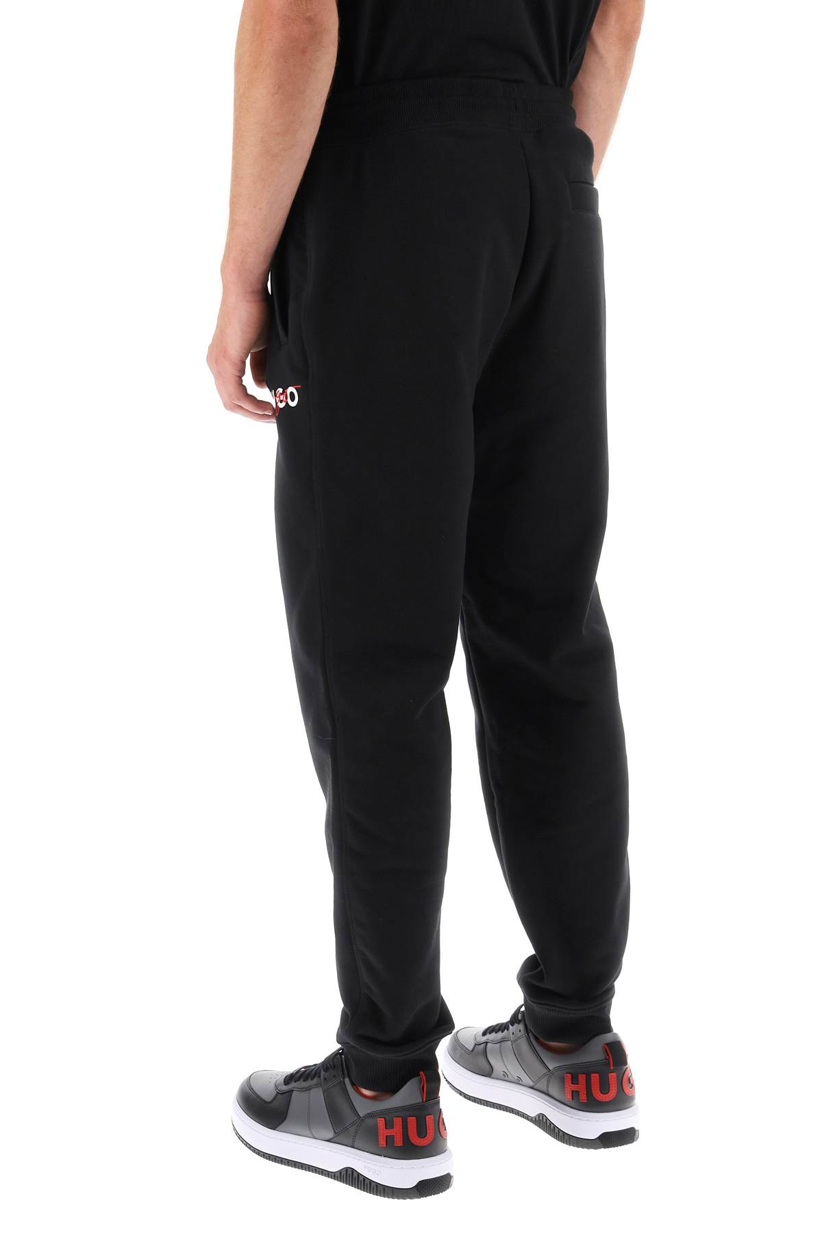 Shop Hugo Boss Drokko Double Logo Sweatpants In Black (black)