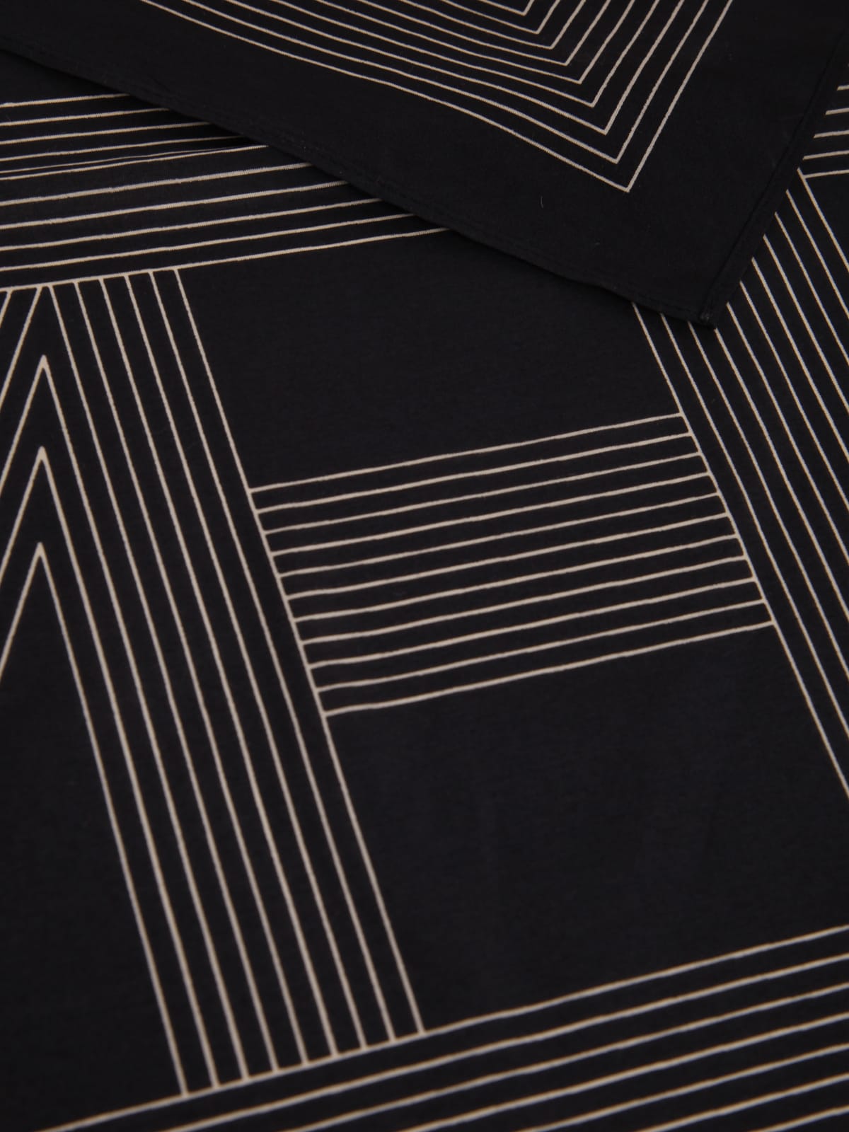 Embroidered monogram silk scarf black – Totême