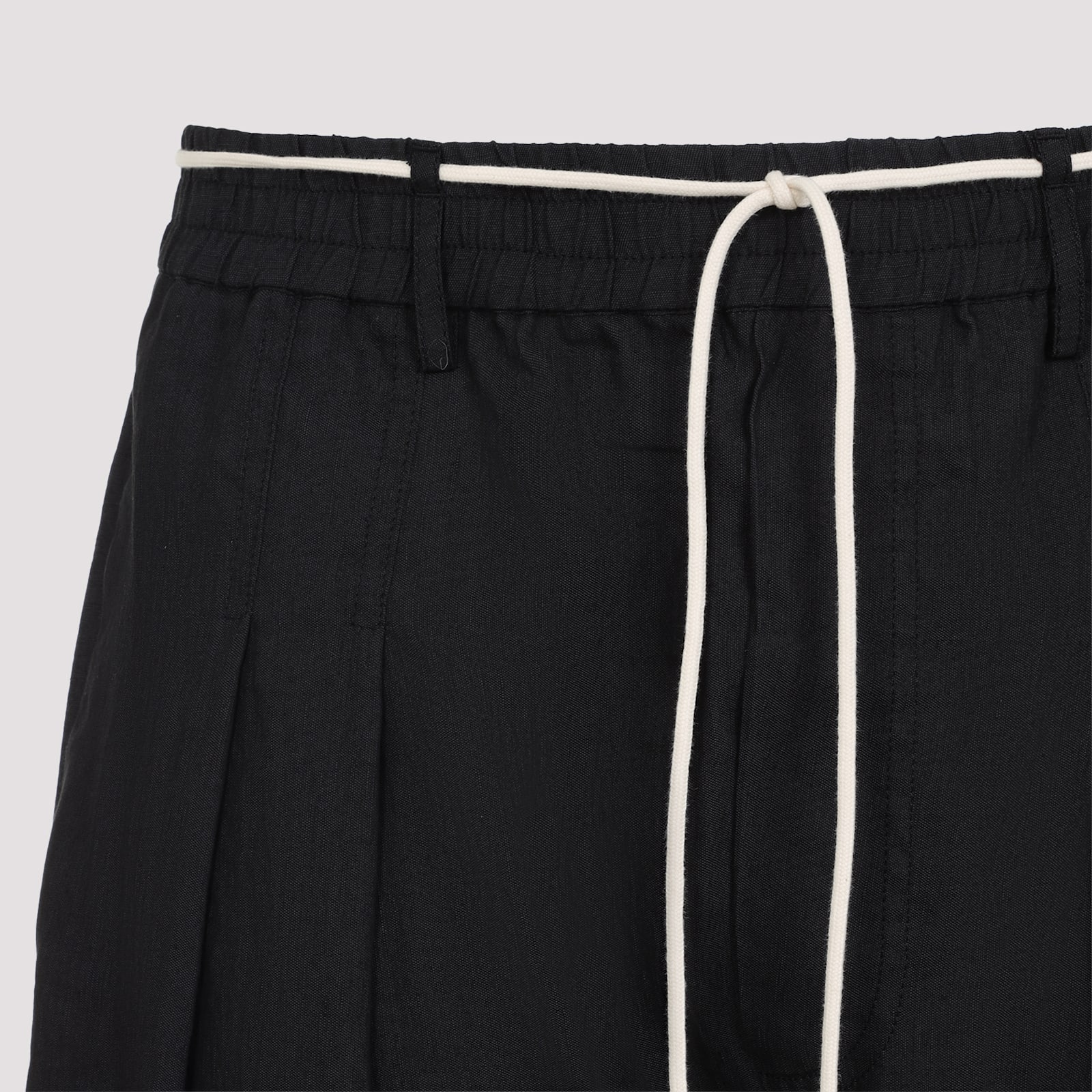 Mordecai Black Virgin Wool Pleated Drawstring Structured Wool Trousers In Black