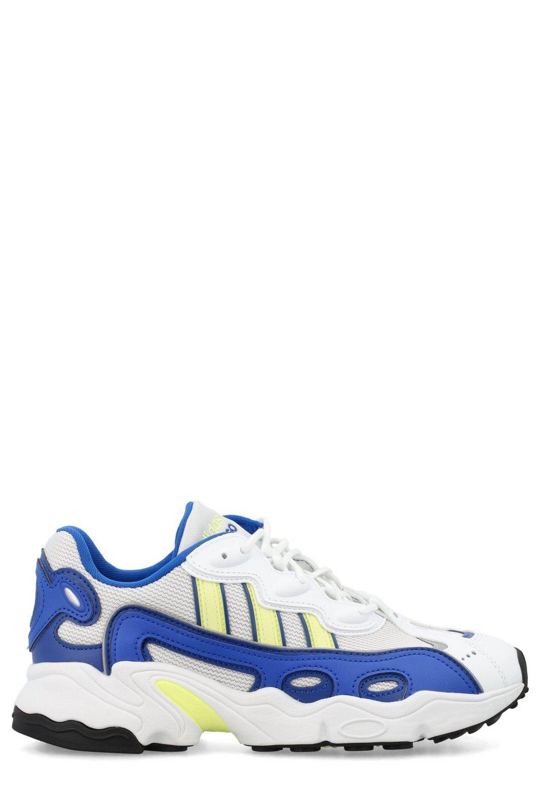 Shop Adidas Originals Ozweego Lace-up Sneakers In Ftwwht/pulyel/royblu