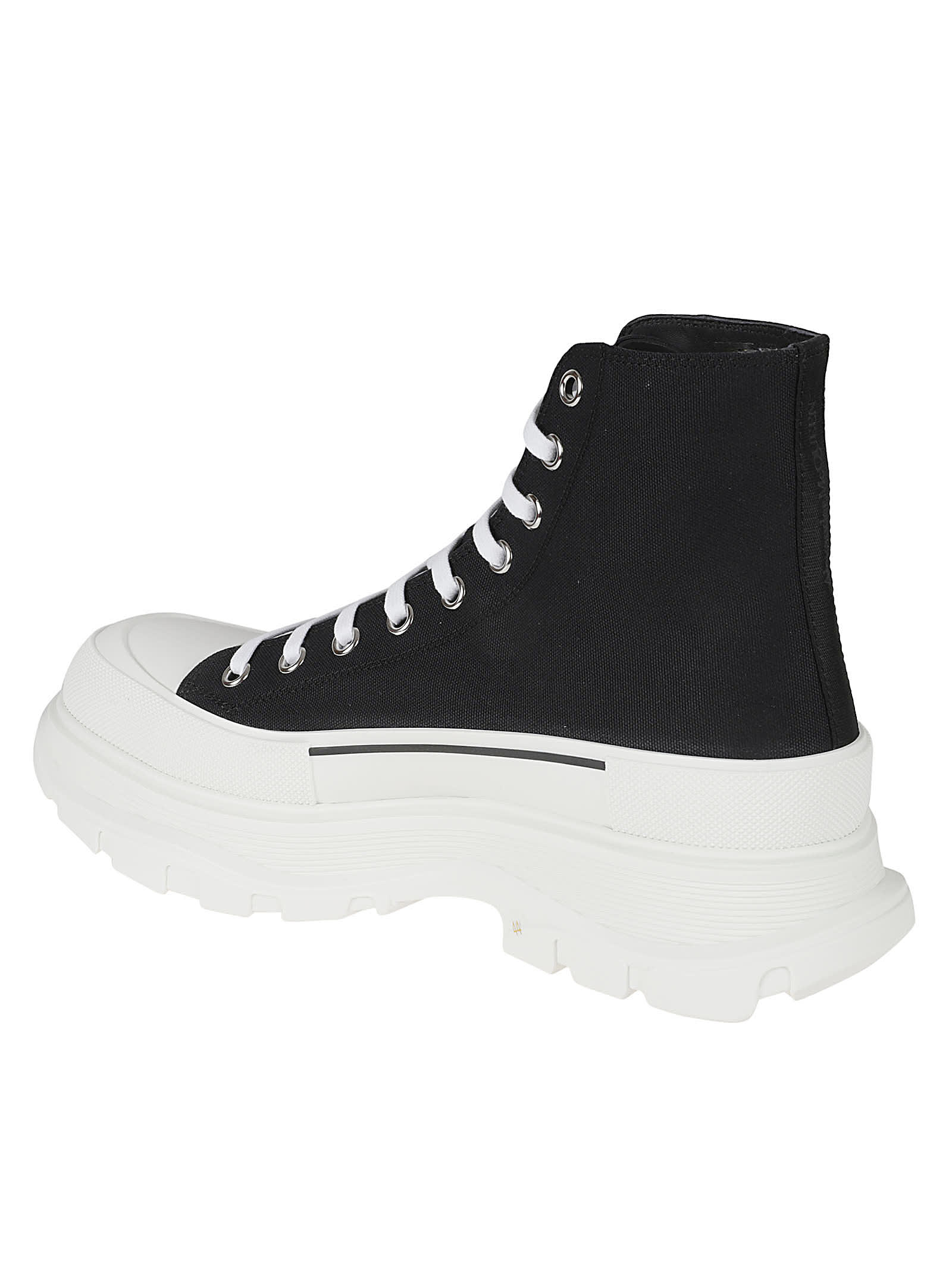 Shop Alexander Mcqueen Logo Embossed Lace-up Boots In Black/white