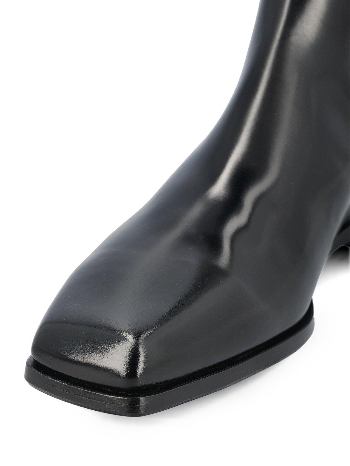 Shop Prada Square-toe Zipped Boots In Black