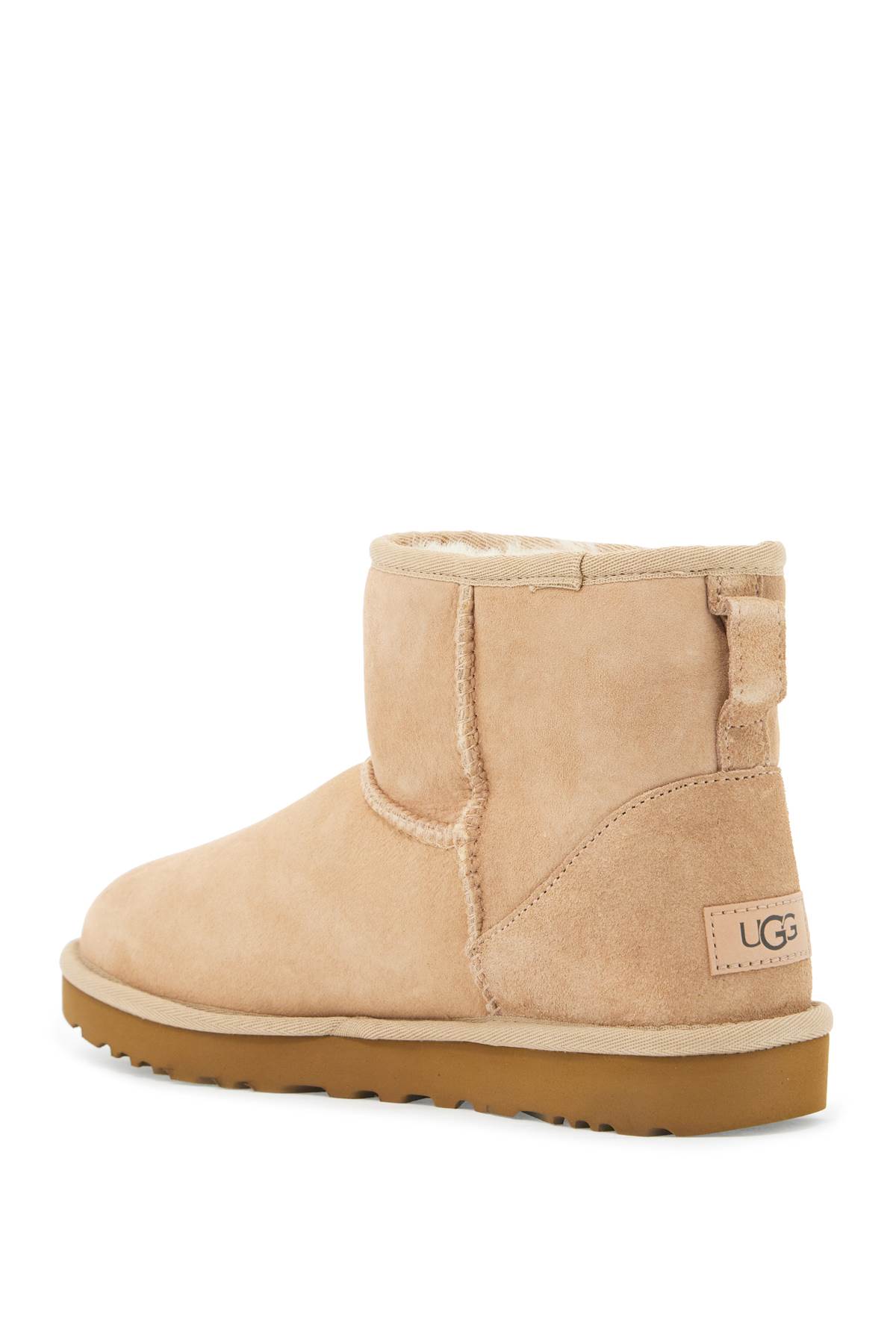 Shop Ugg Classic Mini Ii Ankle Boots In Sand