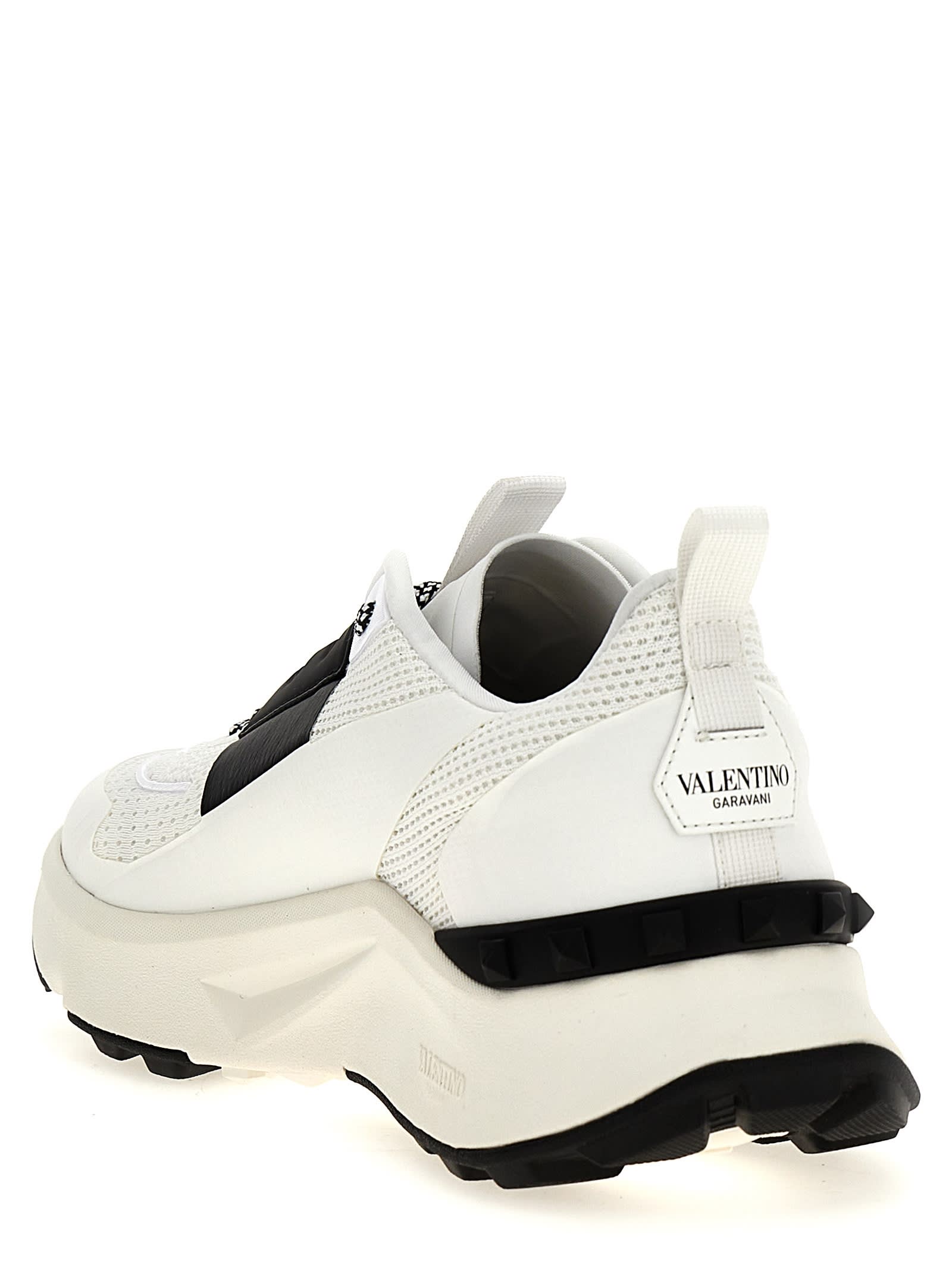 Valentino True Act Low Top Trainer In Mesh And Rubberised Fabric In White/black