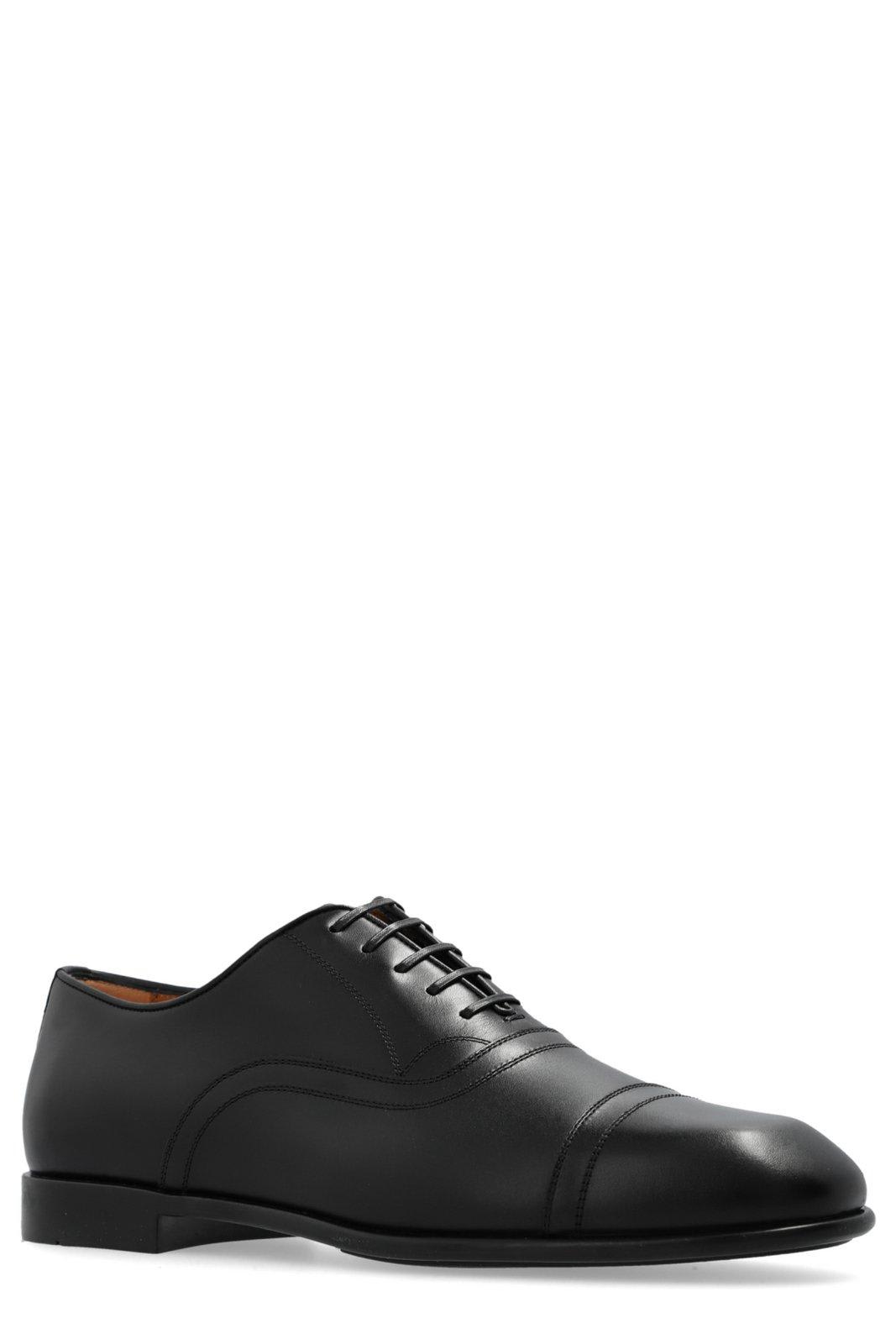 Ferragamo Toe Cap Oxford Shoes In Black
