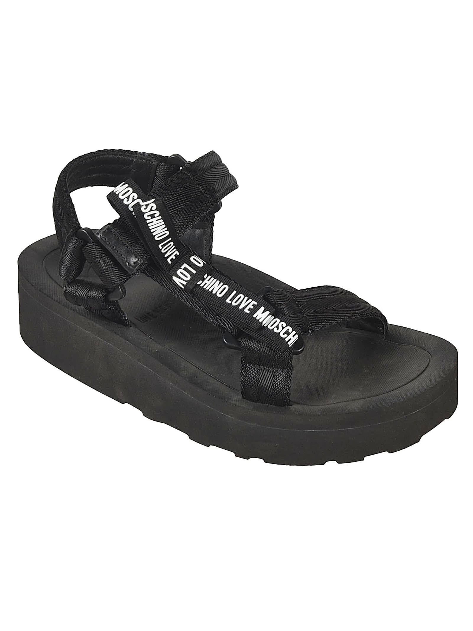 Shop Love Moschino Logo Strap Sandals In Black