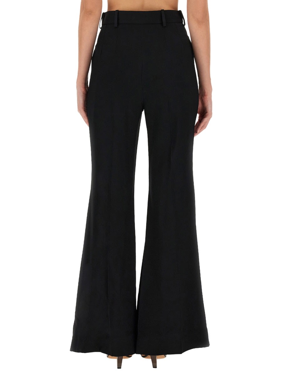 Shop Nina Ricci Flare Fit Pants In Black
