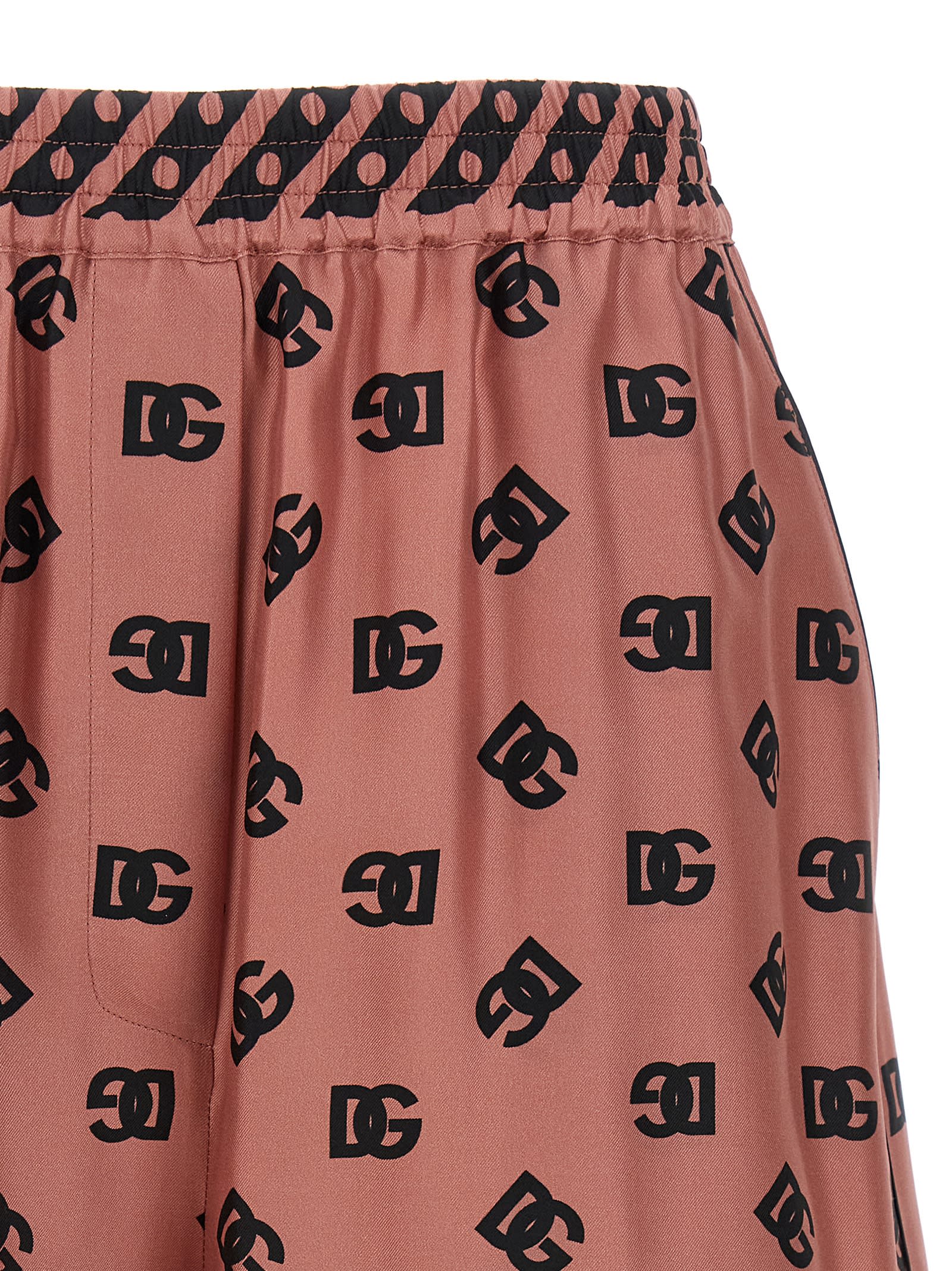 Dolce & Gabbana Pink Bermuda Shorts With Dg Logo Printed All-over In Silk Woman In Pink