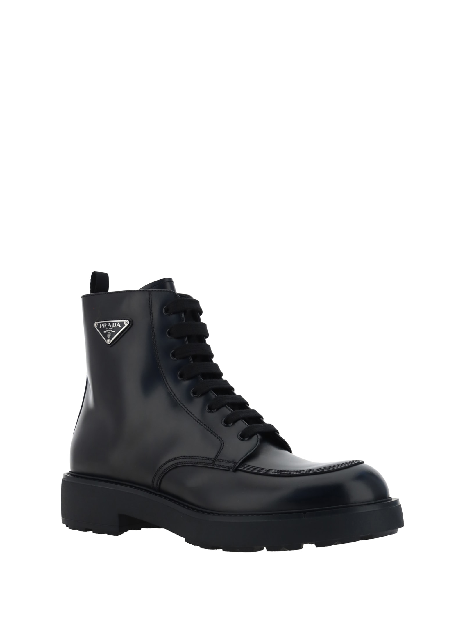 Shop Prada Ankle Boots In Nero