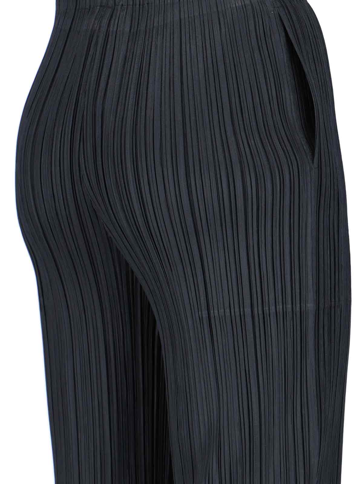 Shop Issey Miyake Pleated Trousers In Black