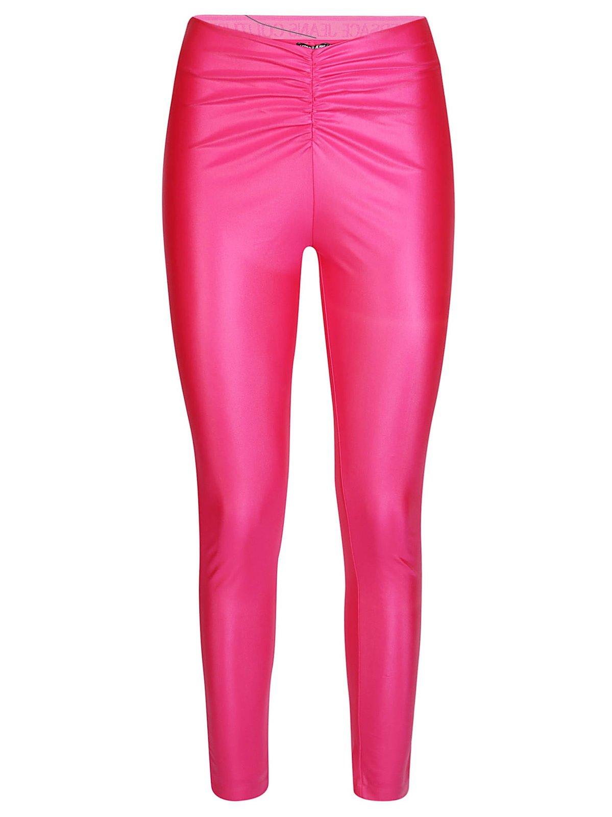 Shop Versace Jeans Couture Ruched Coated Skinny Leggings In Fuxia