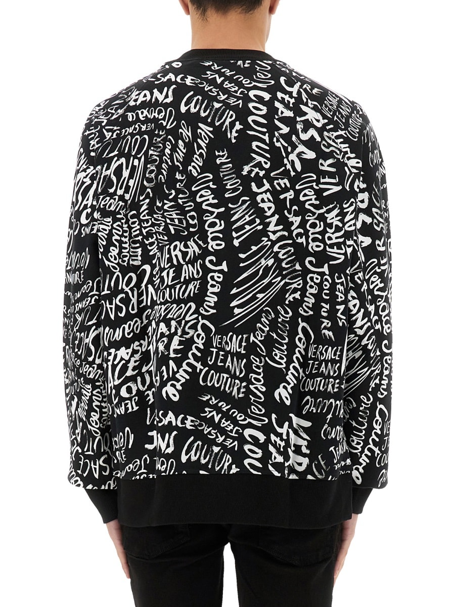 Shop Versace Jeans Couture Sweatshirt With Logomania Print In Black