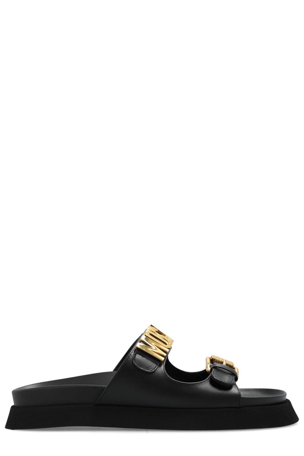 Shop Moschino Logo Lettering Slip-on Sandals In Black