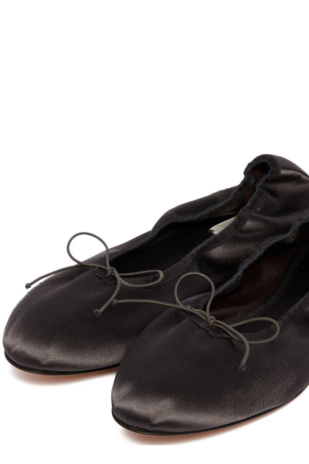 The Row Bow Detailed Slip-on Flat Shoes In Charcoal