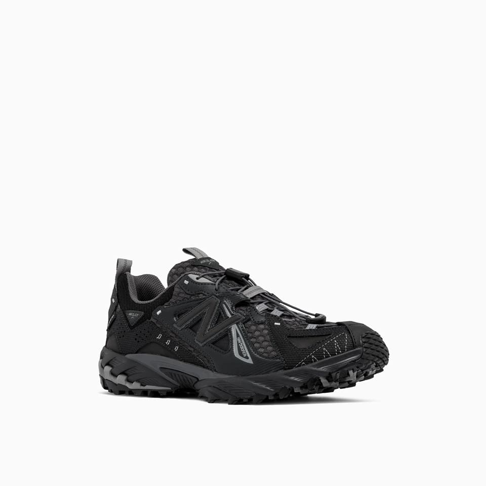 Shop New Balance 610xv1 Sneakers Ml610xj In Black