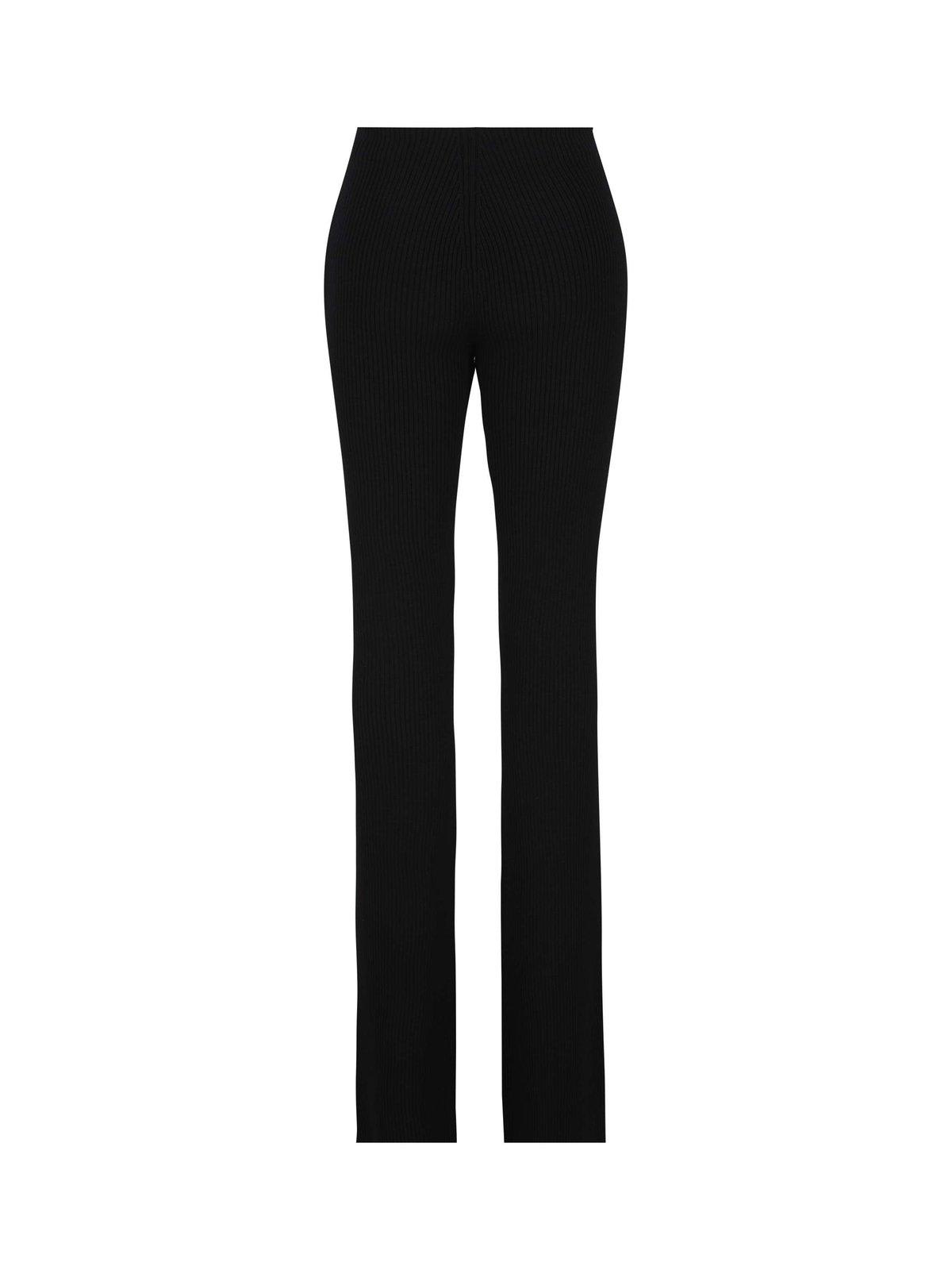 Shop Saint Laurent Low Waisted Ribbed Flared Pants In Black