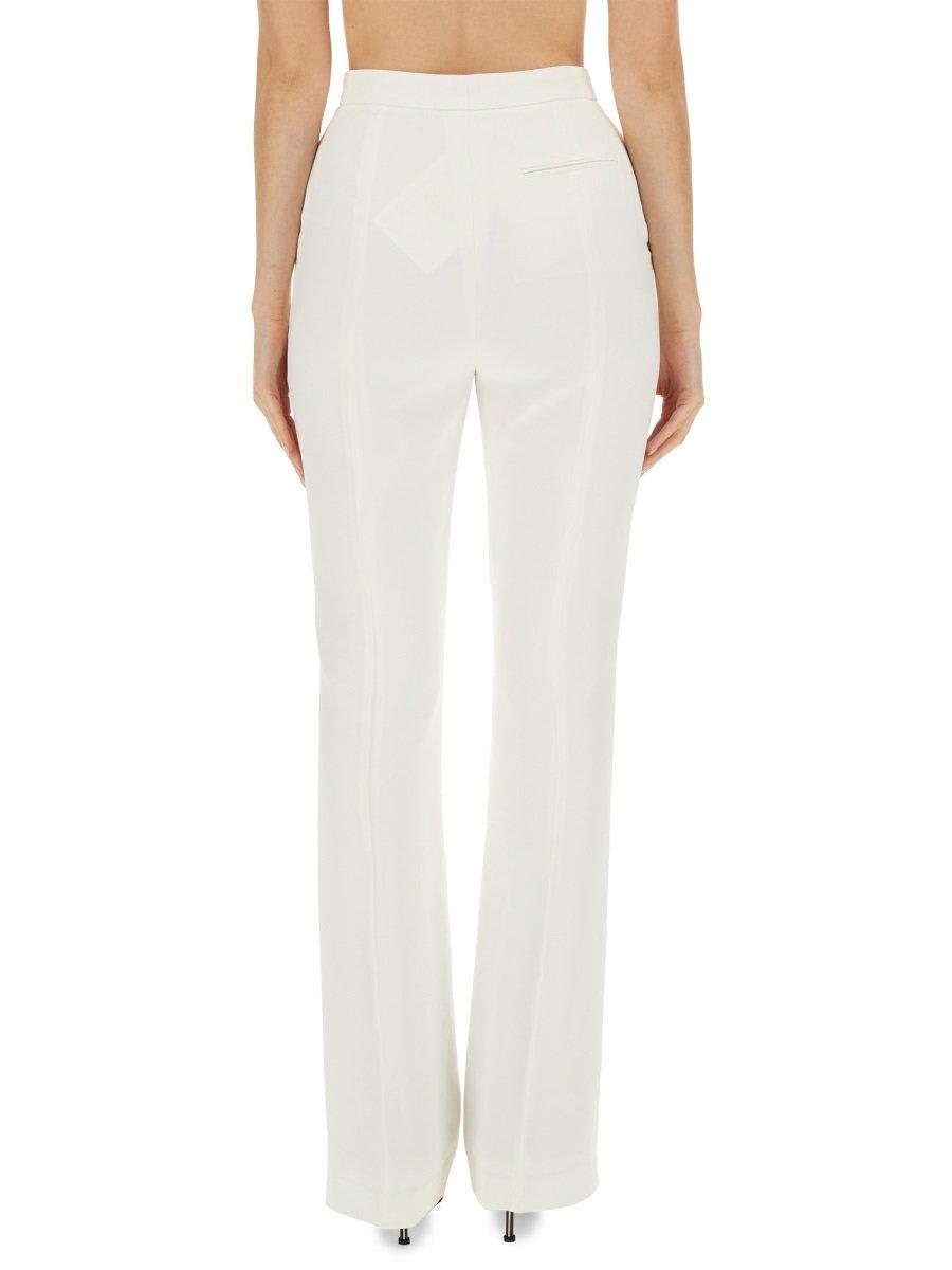 Shop Alexander Mcqueen High-waist Flared Tailored Trousers In White